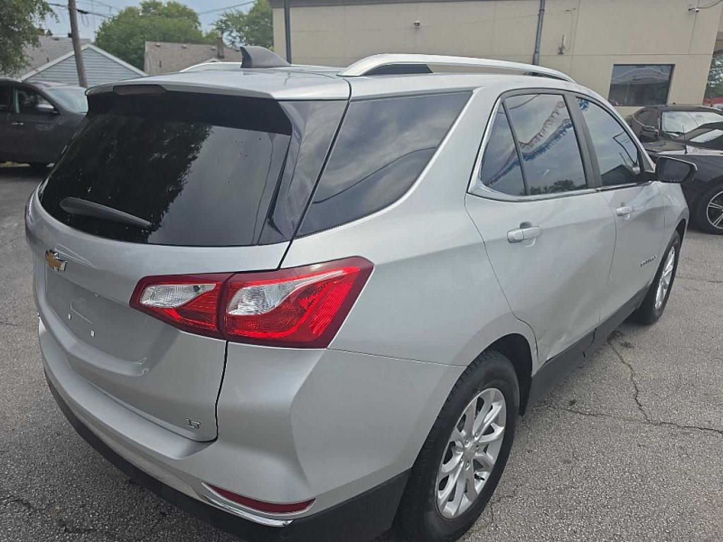 2021 SILVER /BLACK Chevrolet Equinox LT 2WD (3GNAXKEV0MS) with an 1.5L L4 DOHC 16V TURBO engine, 6A transmission, located at 3304 Woodville Road, Northwood, OH, 43619, (419) 210-8019, 41.612694, -83.480743 - Your #1 Destination for Auto Loans and mdash;No Matter Your Credit!At our dealership, we believe everyone deserves the opportunity to drive their dream car and mdash;whether you have good credit, bad credit, or no credit at all. With a wide selection of hundreds of cars, trucks, and SUVs, you'll fin- Photo#4