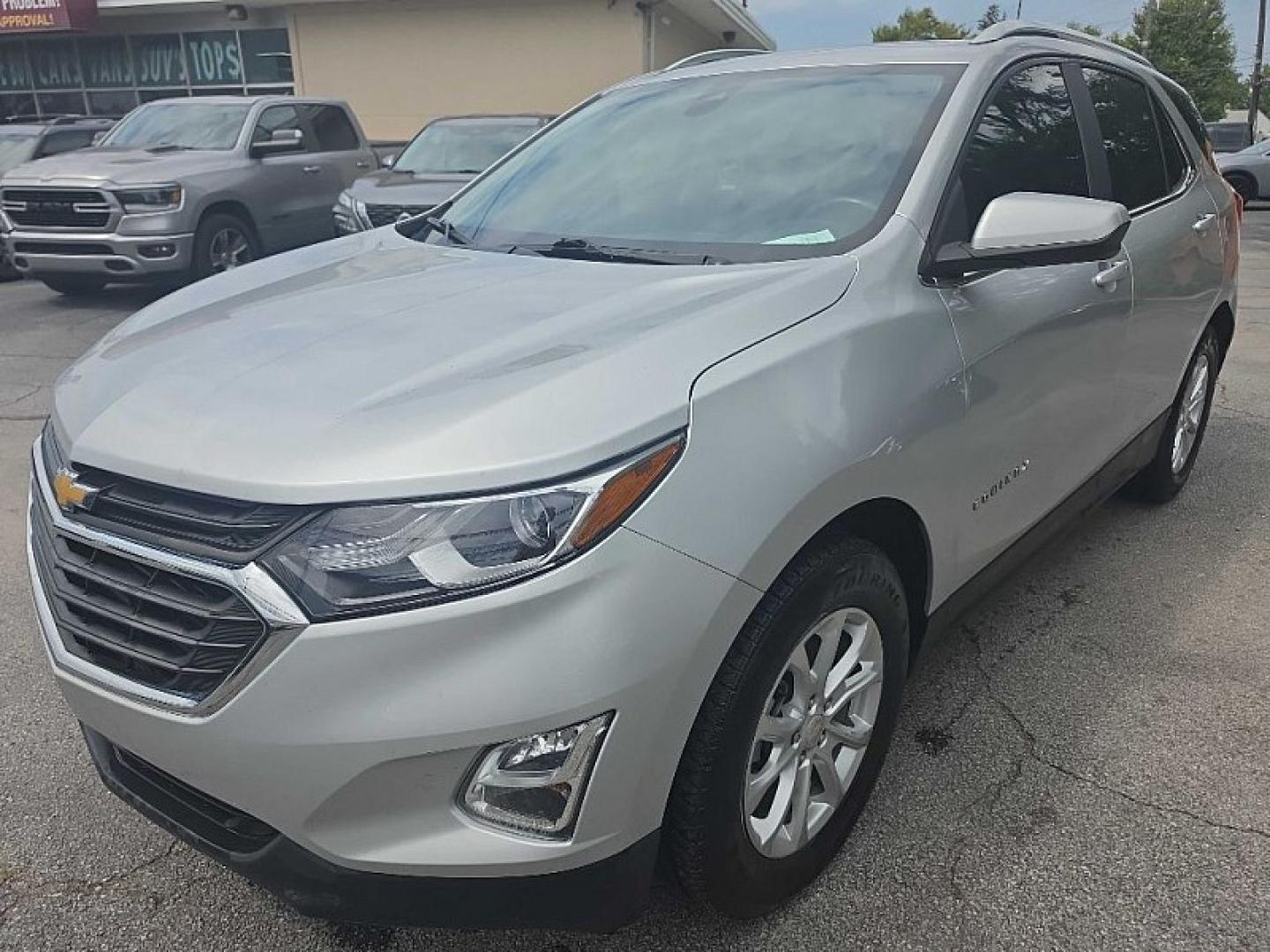 2021 SILVER /BLACK Chevrolet Equinox LT 2WD (3GNAXKEV0MS) with an 1.5L L4 DOHC 16V TURBO engine, 6A transmission, located at 3304 Woodville Road, Northwood, OH, 43619, (419) 210-8019, 41.612694, -83.480743 - Your #1 Destination for Auto Loans and mdash;No Matter Your Credit!At our dealership, we believe everyone deserves the opportunity to drive their dream car and mdash;whether you have good credit, bad credit, or no credit at all. With a wide selection of hundreds of cars, trucks, and SUVs, you'll fin- Photo#0