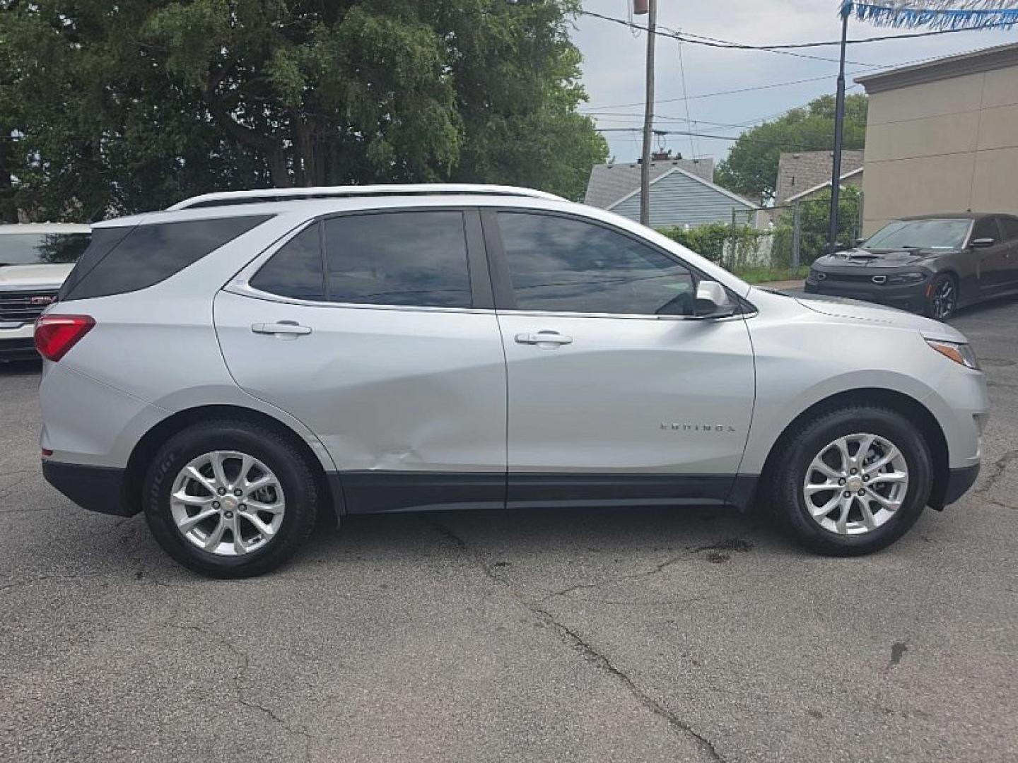 2021 SILVER /BLACK Chevrolet Equinox LT 2WD (3GNAXKEV0MS) with an 1.5L L4 DOHC 16V TURBO engine, 6A transmission, located at 3304 Woodville Road, Northwood, OH, 43619, (419) 210-8019, 41.612694, -83.480743 - Your #1 Destination for Auto Loans and mdash;No Matter Your Credit!At our dealership, we believe everyone deserves the opportunity to drive their dream car and mdash;whether you have good credit, bad credit, or no credit at all. With a wide selection of hundreds of cars, trucks, and SUVs, you'll fin- Photo#5