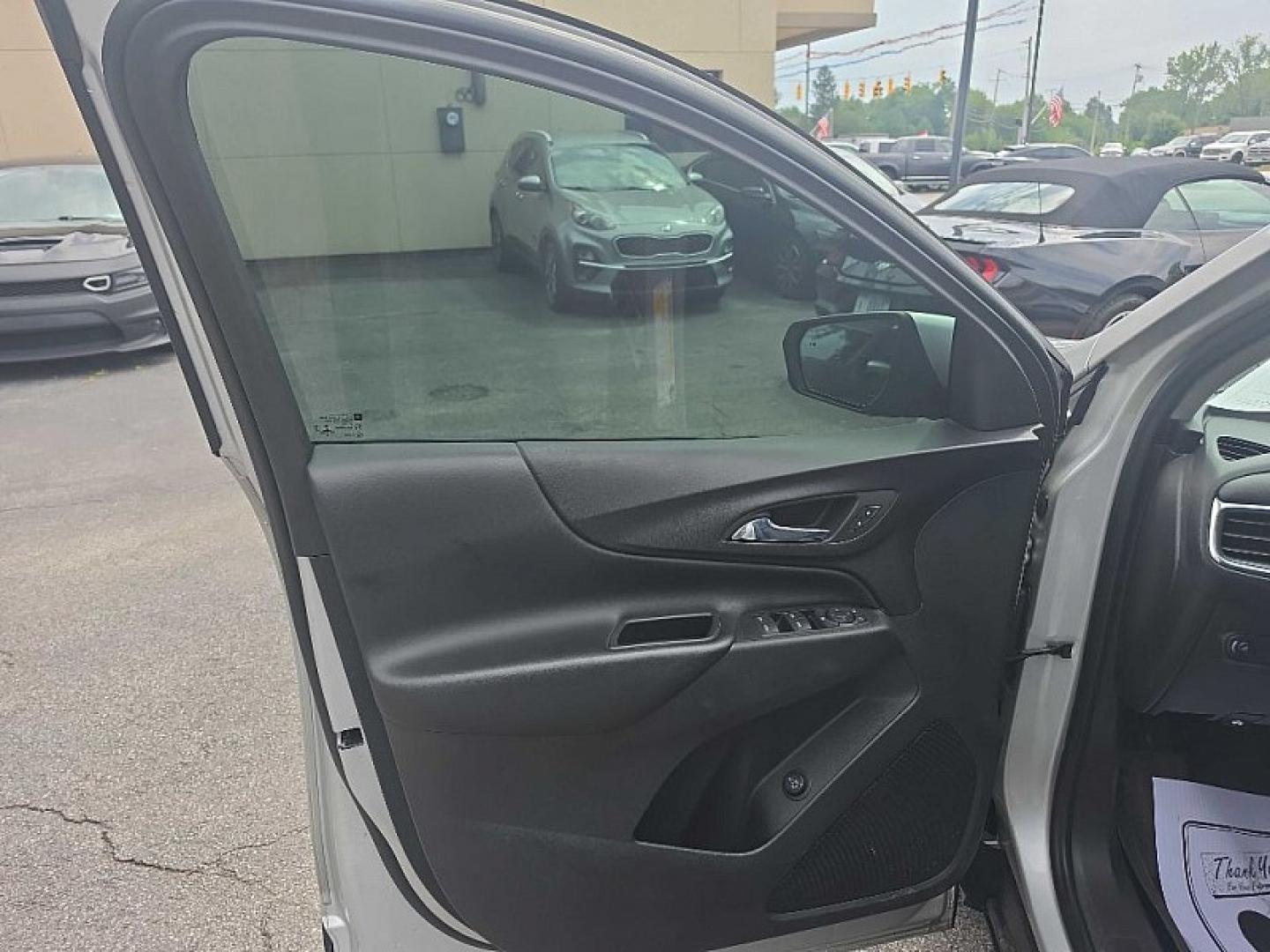 2021 SILVER /BLACK Chevrolet Equinox LT 2WD (3GNAXKEV0MS) with an 1.5L L4 DOHC 16V TURBO engine, 6A transmission, located at 3304 Woodville Road, Northwood, OH, 43619, (419) 210-8019, 41.612694, -83.480743 - Your #1 Destination for Auto Loans and mdash;No Matter Your Credit!At our dealership, we believe everyone deserves the opportunity to drive their dream car and mdash;whether you have good credit, bad credit, or no credit at all. With a wide selection of hundreds of cars, trucks, and SUVs, you'll fin- Photo#8