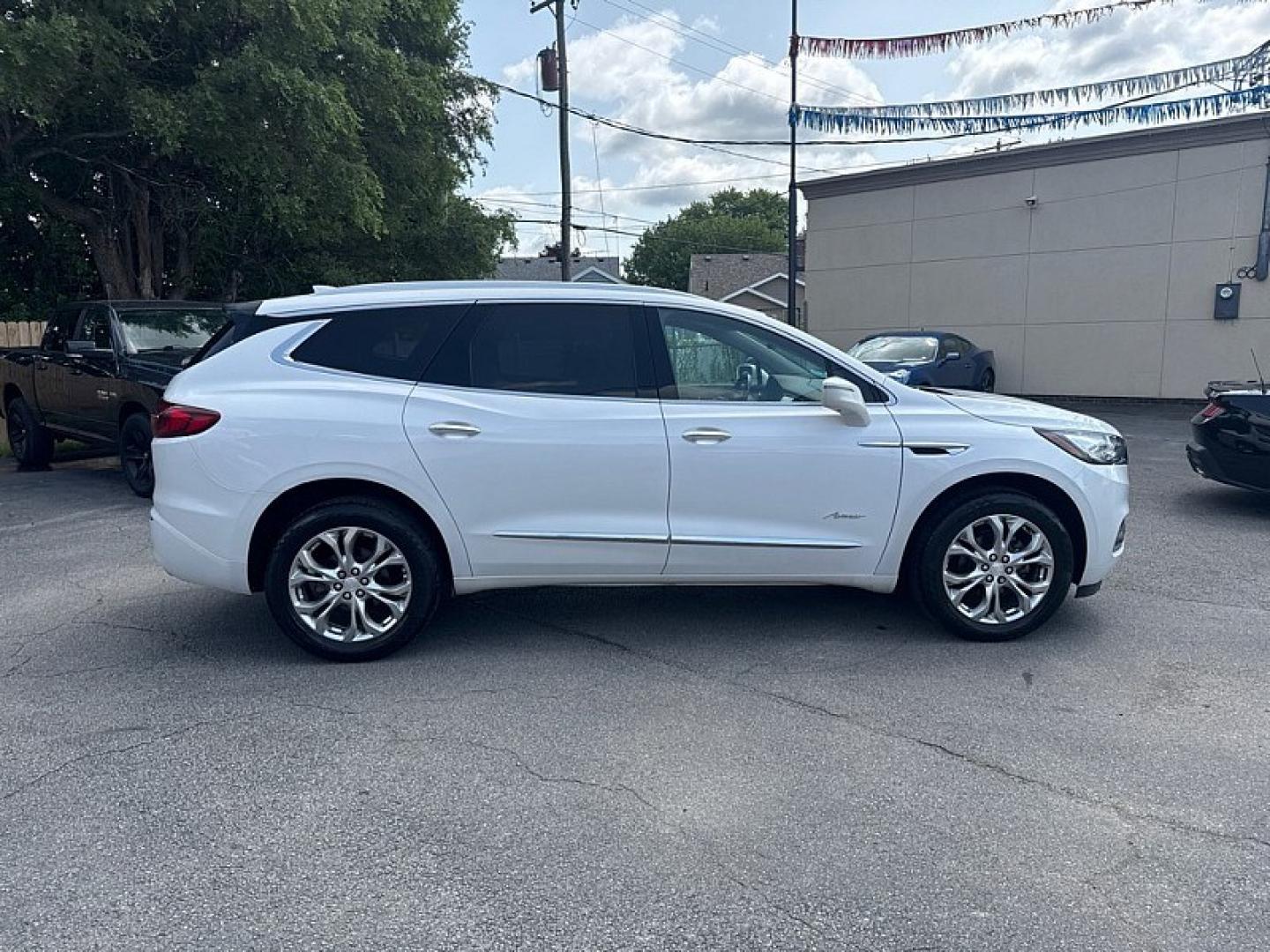 2020 WHITE /BLACK / BROWN Buick Enclave Avenir AWD (5GAEVCKW8LJ) with an 3.6L V6 DOHC 24V engine, 9A transmission, located at 3304 Woodville Road, Northwood, OH, 43619, (419) 210-8019, 41.612694, -83.480743 - Your #1 Destination for Auto Loans and mdash;No Matter Your Credit!At our dealership, we believe everyone deserves the opportunity to drive their dream car and mdash;whether you have good credit, bad credit, or no credit at all. With a wide selection of hundreds of cars, trucks, and SUVs, you'll fin- Photo#5