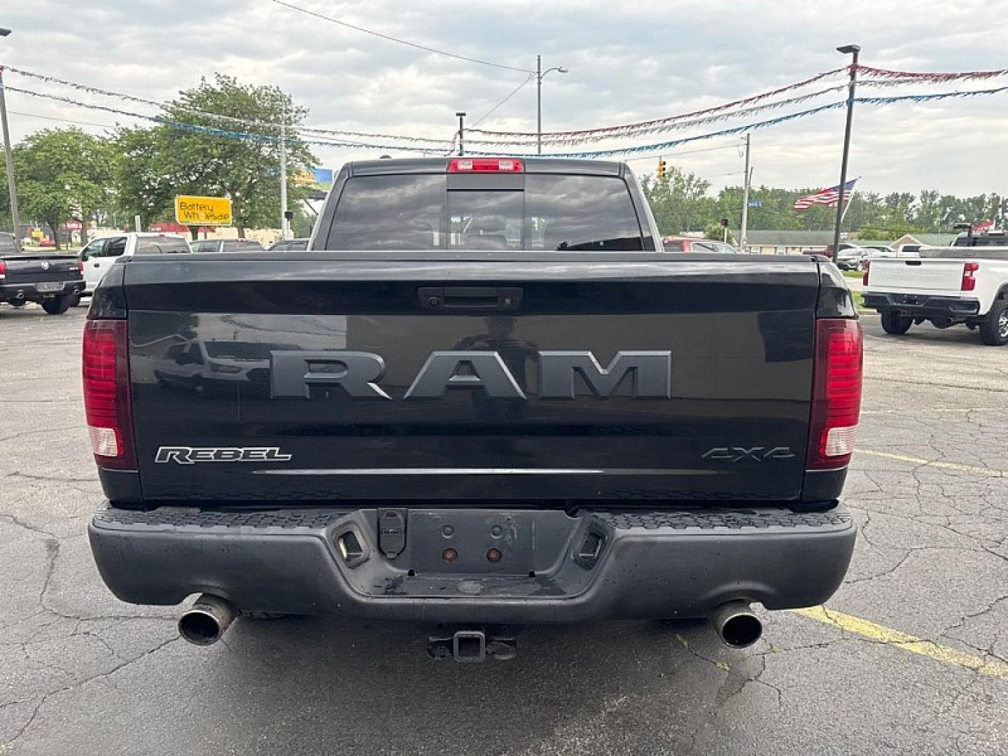2016 BLACK /BLACK RAM 1500 Rebel Crew Cab SWB 4WD (1C6RR7YT8GS) with an 5.7L V8 OHV 16V engine, 6A transmission, located at 3304 Woodville Road, Northwood, OH, 43619, (419) 210-8019, 41.612694, -83.480743 - Your #1 Destination for Auto Loans and mdash;No Matter Your Credit!At our dealership, we believe everyone deserves the opportunity to drive their dream car and mdash;whether you have good credit, bad credit, or no credit at all. With a wide selection of hundreds of cars, trucks, and SUVs, you'll fin- Photo#3
