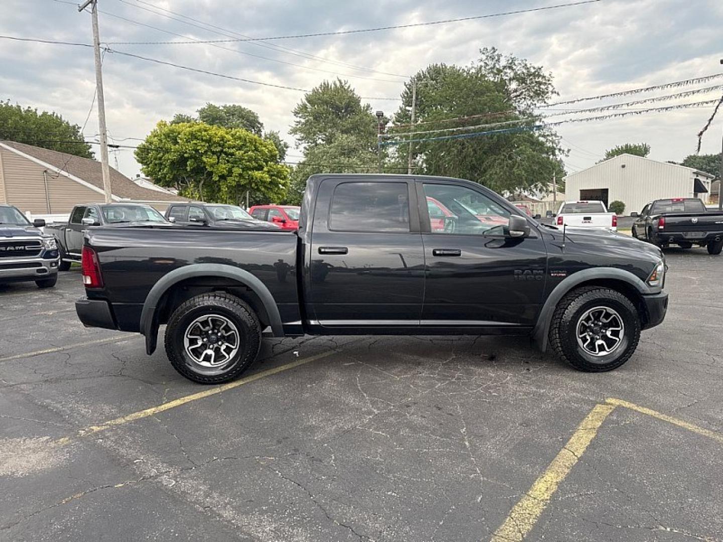 2016 BLACK /BLACK RAM 1500 Rebel Crew Cab SWB 4WD (1C6RR7YT8GS) with an 5.7L V8 OHV 16V engine, 6A transmission, located at 3304 Woodville Road, Northwood, OH, 43619, (419) 210-8019, 41.612694, -83.480743 - Your #1 Destination for Auto Loans and mdash;No Matter Your Credit!At our dealership, we believe everyone deserves the opportunity to drive their dream car and mdash;whether you have good credit, bad credit, or no credit at all. With a wide selection of hundreds of cars, trucks, and SUVs, you'll fin- Photo#5