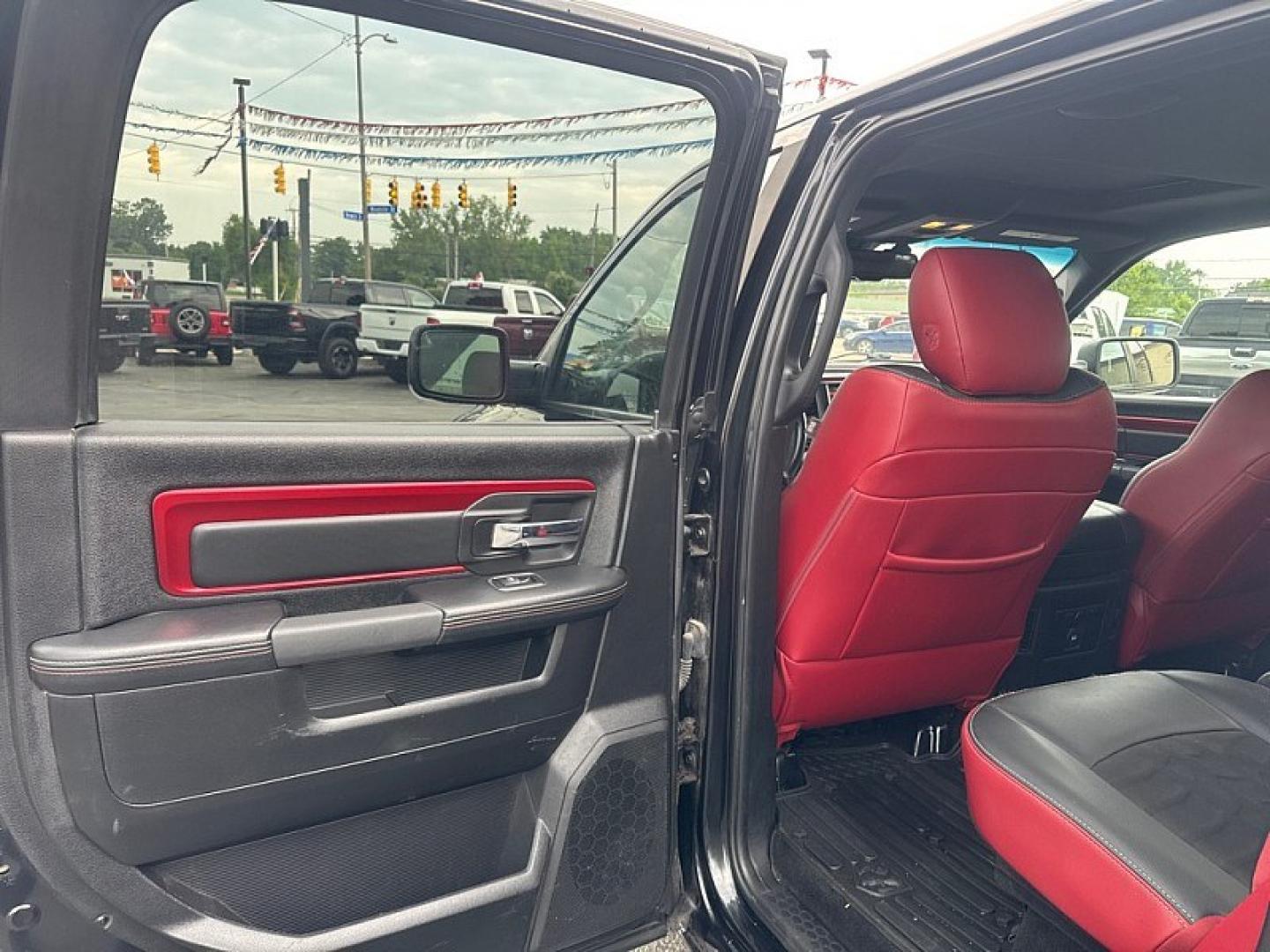 2016 BLACK /BLACK RAM 1500 Rebel Crew Cab SWB 4WD (1C6RR7YT8GS) with an 5.7L V8 OHV 16V engine, 6A transmission, located at 3304 Woodville Road, Northwood, OH, 43619, (419) 210-8019, 41.612694, -83.480743 - Your #1 Destination for Auto Loans and mdash;No Matter Your Credit!At our dealership, we believe everyone deserves the opportunity to drive their dream car and mdash;whether you have good credit, bad credit, or no credit at all. With a wide selection of hundreds of cars, trucks, and SUVs, you'll fin- Photo#10