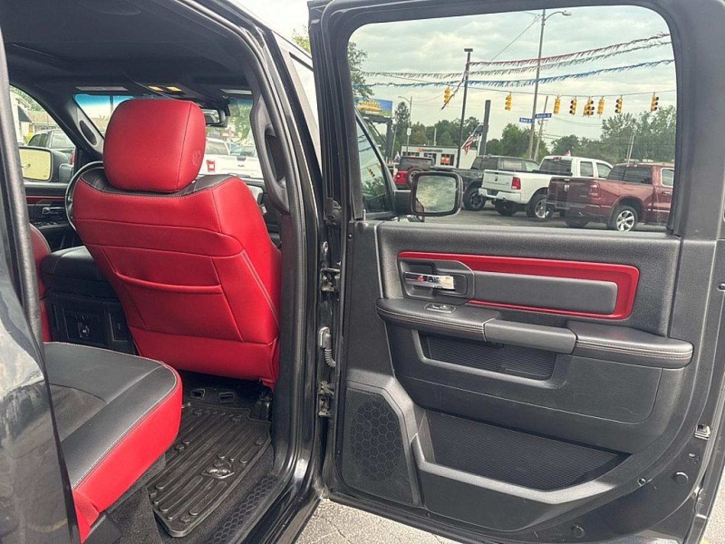 2016 BLACK /BLACK RAM 1500 Rebel Crew Cab SWB 4WD (1C6RR7YT8GS) with an 5.7L V8 OHV 16V engine, 6A transmission, located at 3304 Woodville Road, Northwood, OH, 43619, (419) 210-8019, 41.612694, -83.480743 - Your #1 Destination for Auto Loans and mdash;No Matter Your Credit!At our dealership, we believe everyone deserves the opportunity to drive their dream car and mdash;whether you have good credit, bad credit, or no credit at all. With a wide selection of hundreds of cars, trucks, and SUVs, you'll fin- Photo#12
