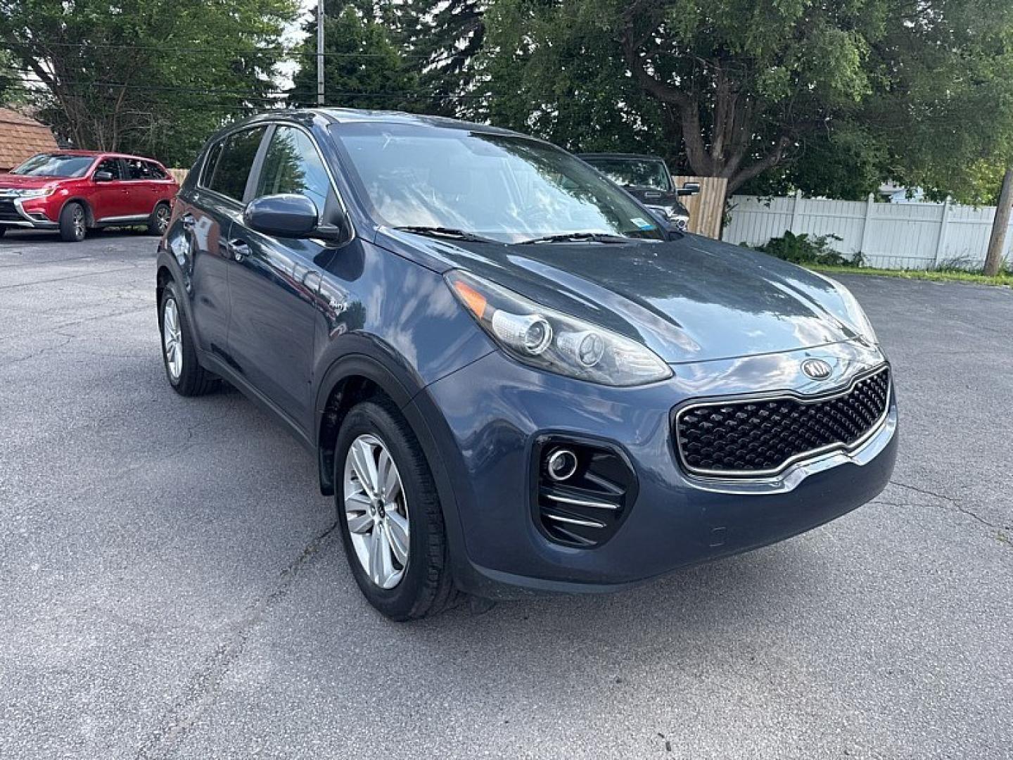 2017 BLUE /BLACK Kia Sportage LX AWD (KNDPMCAC8H7) with an 2.4L V6 DOHC 24V engine, 6A transmission, located at 3304 Woodville Road, Northwood, OH, 43619, (419) 210-8019, 41.612694, -83.480743 - Your #1 Destination for Auto Loans and mdash;No Matter Your Credit!At our dealership, we believe everyone deserves the opportunity to drive their dream car and mdash;whether you have good credit, bad credit, or no credit at all. With a wide selection of hundreds of cars, trucks, and SUVs, you'll fin- Photo#6