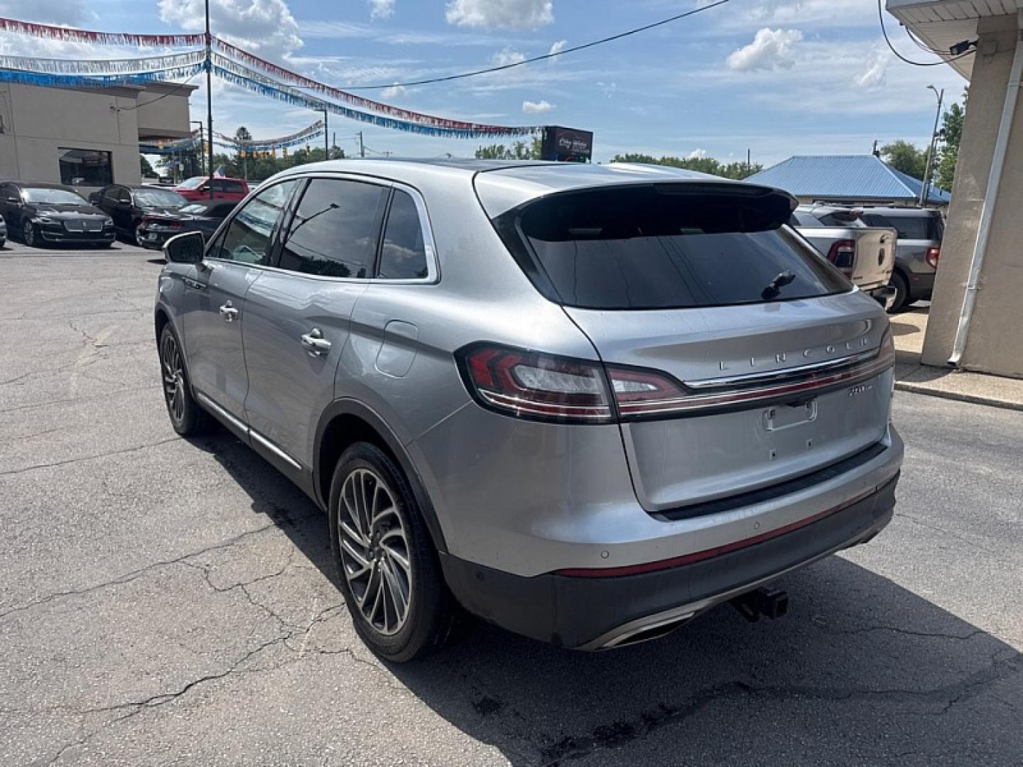 2020 SILVER /BLACK Lincoln Nautilus Reserve AWD (2LMPJ8K98LB) with an 2.0L L4 DOHC 16V engine, 6A transmission, located at 3304 Woodville Road, Northwood, OH, 43619, (419) 210-8019, 41.612694, -83.480743- Photo#2