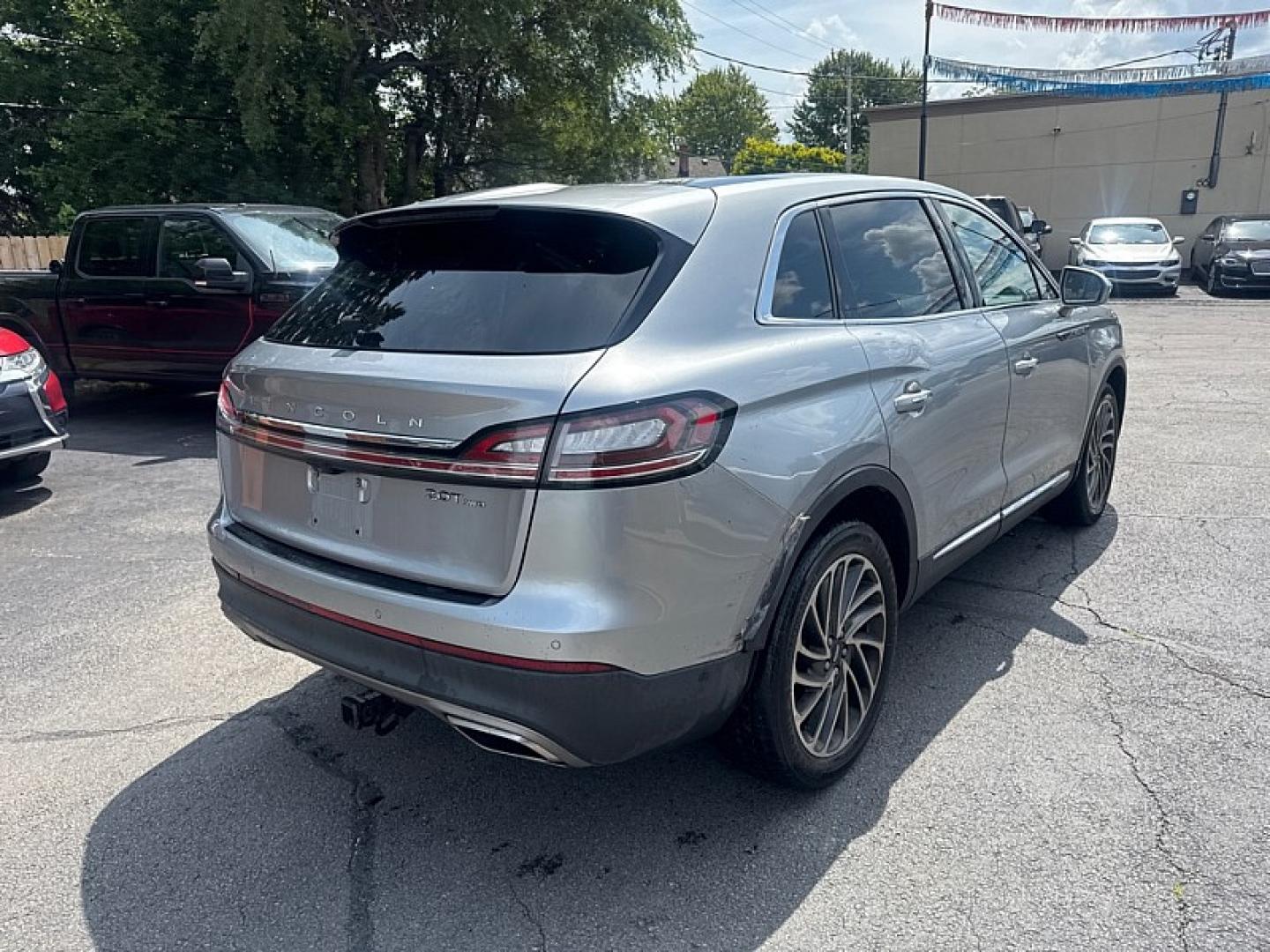 2020 SILVER /BLACK Lincoln Nautilus Reserve AWD (2LMPJ8K98LB) with an 2.0L L4 DOHC 16V engine, 6A transmission, located at 3304 Woodville Road, Northwood, OH, 43619, (419) 210-8019, 41.612694, -83.480743- Photo#4