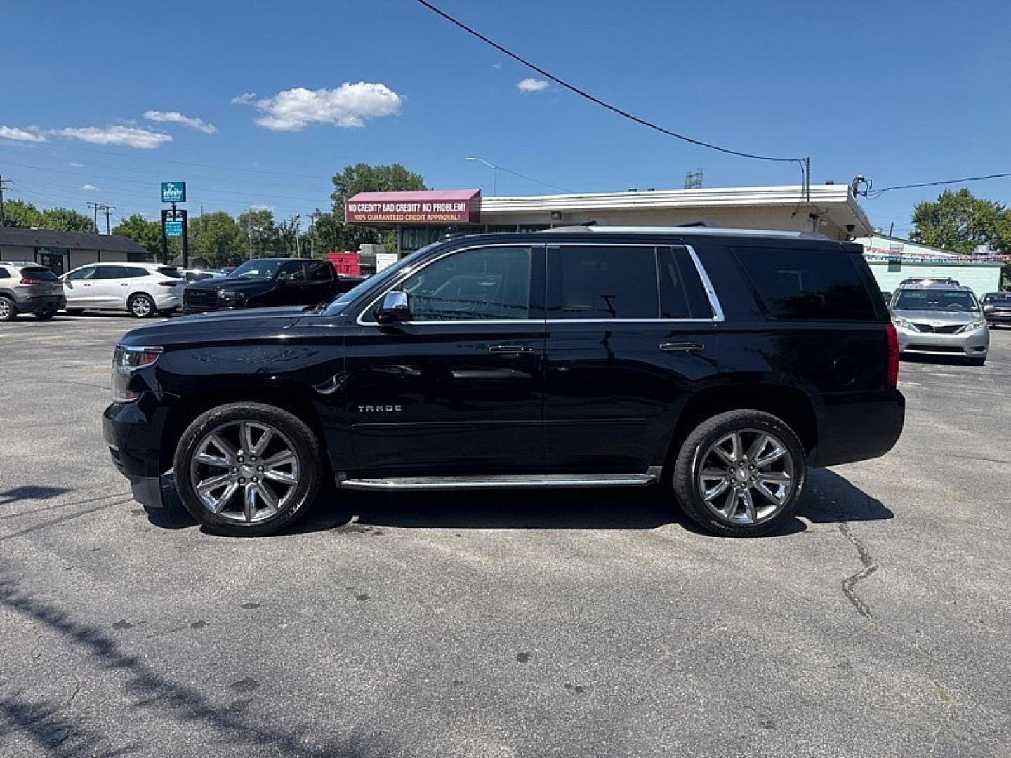 2017 BLACK /BLACK Chevrolet Tahoe Premier 4WD (1GNSKCKC5HR) with an 5.3L V8 OHV 16V engine, 6A transmission, located at 3304 Woodville Road, Northwood, OH, 43619, (419) 210-8019, 41.612694, -83.480743 - Your #1 Destination for Auto Loans and mdash;No Matter Your Credit!At our dealership, we believe everyone deserves the opportunity to drive their dream car and mdash;whether you have good credit, bad credit, or no credit at all. With a wide selection of hundreds of cars, trucks, and SUVs, you'll fin- Photo#1