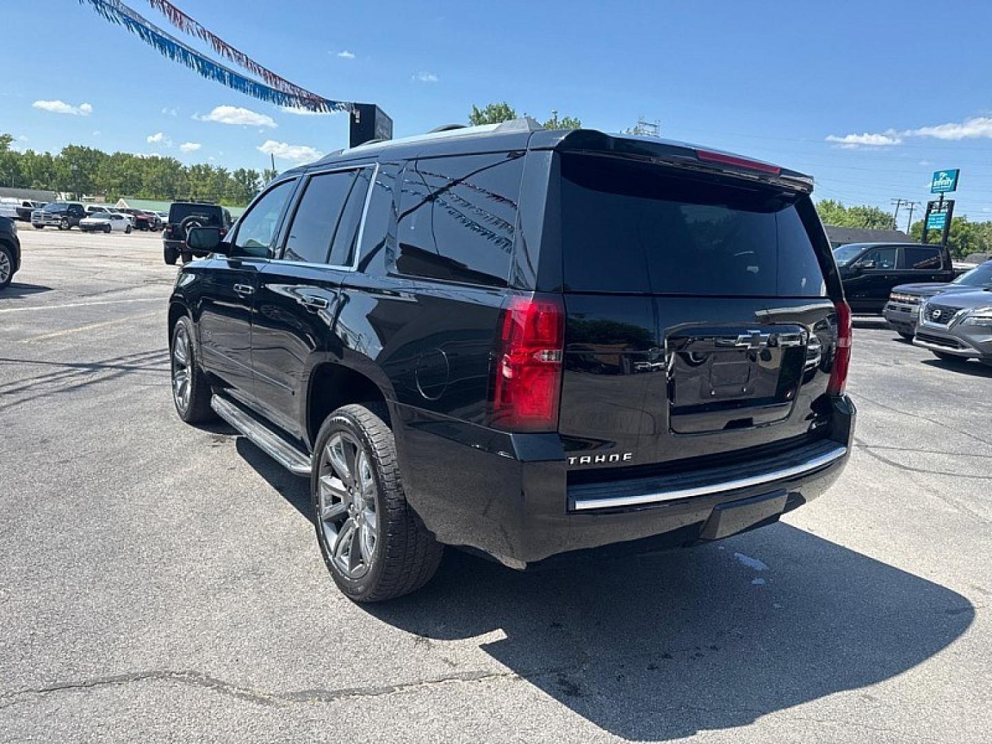 2017 BLACK /BLACK Chevrolet Tahoe Premier 4WD (1GNSKCKC5HR) with an 5.3L V8 OHV 16V engine, 6A transmission, located at 3304 Woodville Road, Northwood, OH, 43619, (419) 210-8019, 41.612694, -83.480743 - Your #1 Destination for Auto Loans and mdash;No Matter Your Credit!At our dealership, we believe everyone deserves the opportunity to drive their dream car and mdash;whether you have good credit, bad credit, or no credit at all. With a wide selection of hundreds of cars, trucks, and SUVs, you'll fin- Photo#2