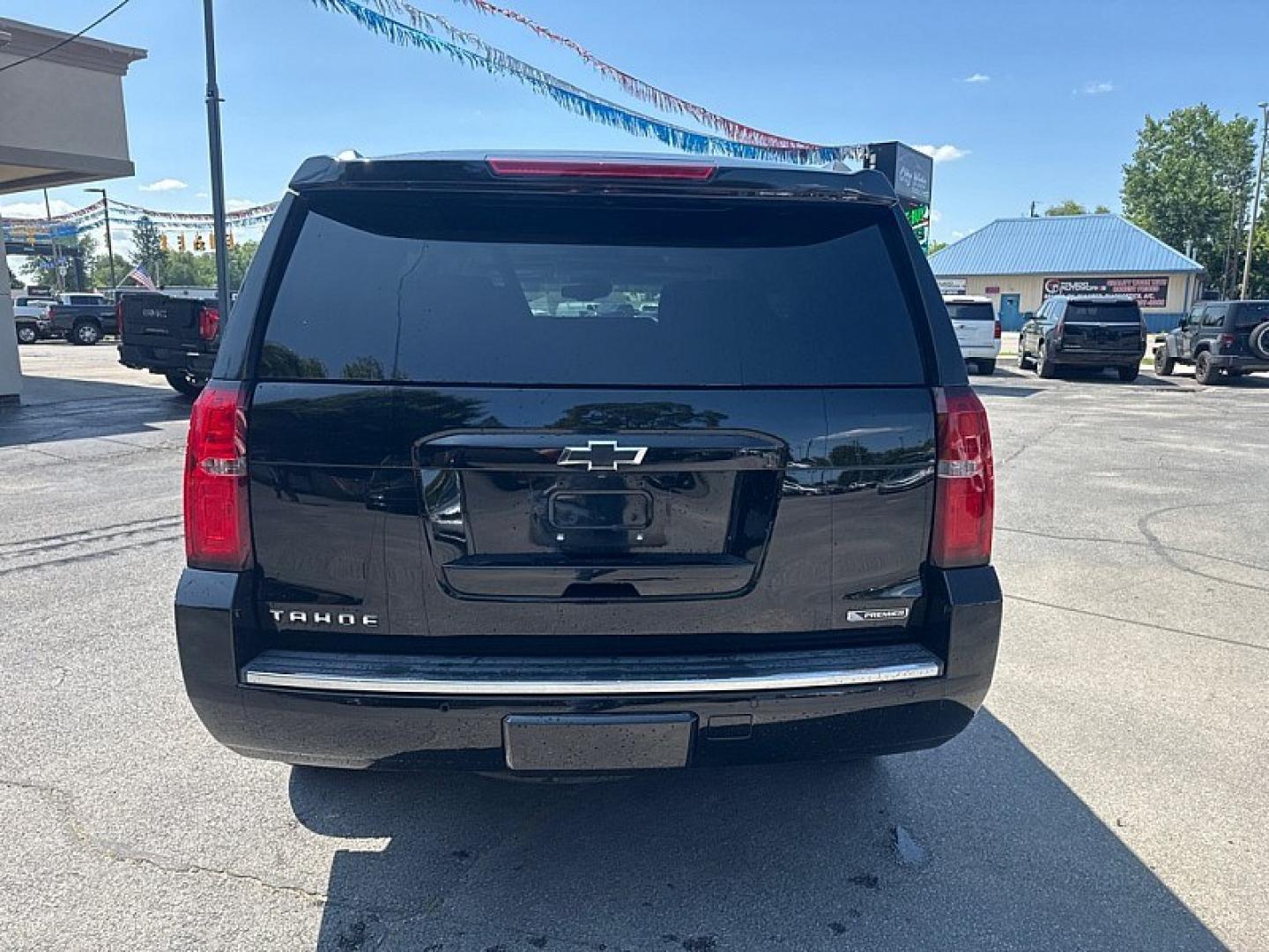 2017 BLACK /BLACK Chevrolet Tahoe Premier 4WD (1GNSKCKC5HR) with an 5.3L V8 OHV 16V engine, 6A transmission, located at 3304 Woodville Road, Northwood, OH, 43619, (419) 210-8019, 41.612694, -83.480743 - Your #1 Destination for Auto Loans and mdash;No Matter Your Credit!At our dealership, we believe everyone deserves the opportunity to drive their dream car and mdash;whether you have good credit, bad credit, or no credit at all. With a wide selection of hundreds of cars, trucks, and SUVs, you'll fin- Photo#3