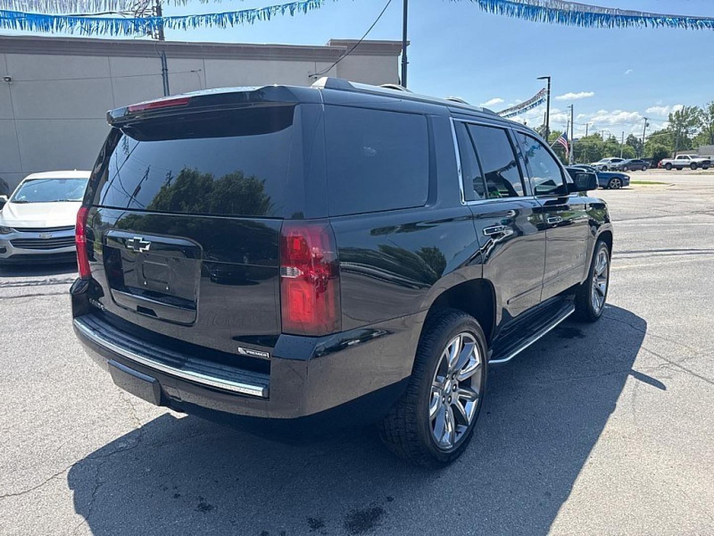 2017 BLACK /BLACK Chevrolet Tahoe Premier 4WD (1GNSKCKC5HR) with an 5.3L V8 OHV 16V engine, 6A transmission, located at 3304 Woodville Road, Northwood, OH, 43619, (419) 210-8019, 41.612694, -83.480743 - Your #1 Destination for Auto Loans and mdash;No Matter Your Credit!At our dealership, we believe everyone deserves the opportunity to drive their dream car and mdash;whether you have good credit, bad credit, or no credit at all. With a wide selection of hundreds of cars, trucks, and SUVs, you'll fin- Photo#4