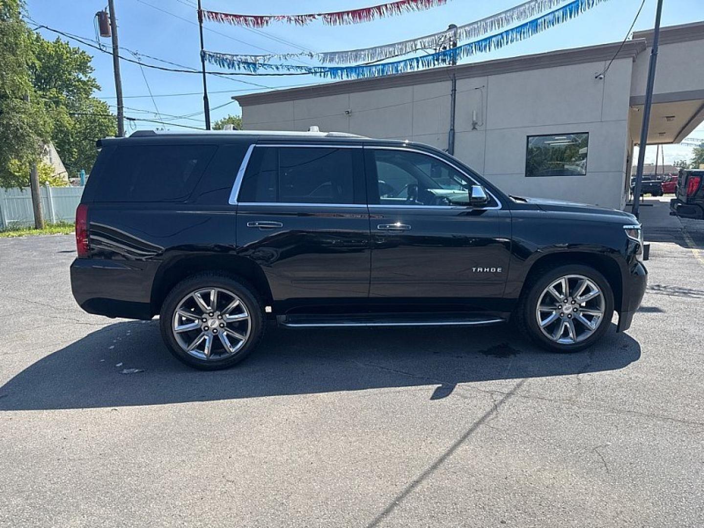2017 BLACK /BLACK Chevrolet Tahoe Premier 4WD (1GNSKCKC5HR) with an 5.3L V8 OHV 16V engine, 6A transmission, located at 3304 Woodville Road, Northwood, OH, 43619, (419) 210-8019, 41.612694, -83.480743 - Your #1 Destination for Auto Loans and mdash;No Matter Your Credit!At our dealership, we believe everyone deserves the opportunity to drive their dream car and mdash;whether you have good credit, bad credit, or no credit at all. With a wide selection of hundreds of cars, trucks, and SUVs, you'll fin- Photo#5