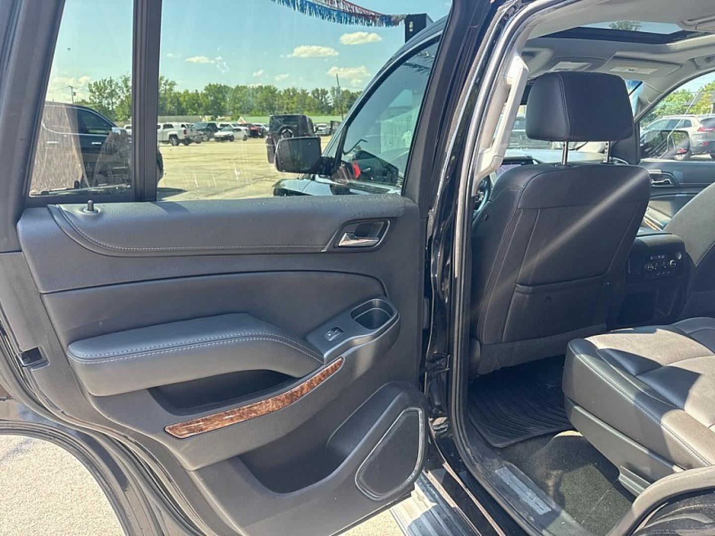2017 BLACK /BLACK Chevrolet Tahoe Premier 4WD (1GNSKCKC5HR) with an 5.3L V8 OHV 16V engine, 6A transmission, located at 3304 Woodville Road, Northwood, OH, 43619, (419) 210-8019, 41.612694, -83.480743 - Your #1 Destination for Auto Loans and mdash;No Matter Your Credit!At our dealership, we believe everyone deserves the opportunity to drive their dream car and mdash;whether you have good credit, bad credit, or no credit at all. With a wide selection of hundreds of cars, trucks, and SUVs, you'll fin- Photo#10