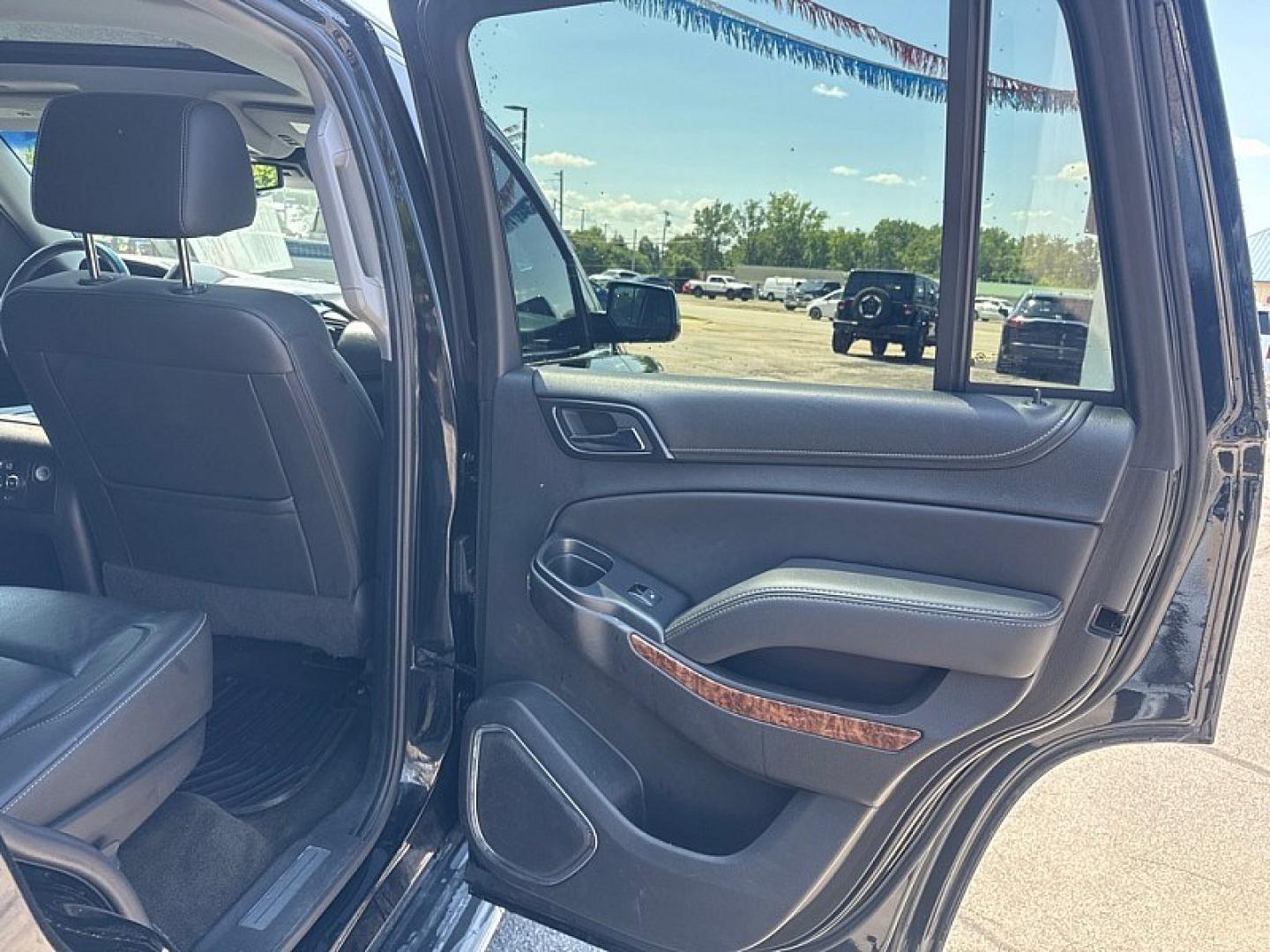2017 BLACK /BLACK Chevrolet Tahoe Premier 4WD (1GNSKCKC5HR) with an 5.3L V8 OHV 16V engine, 6A transmission, located at 3304 Woodville Road, Northwood, OH, 43619, (419) 210-8019, 41.612694, -83.480743 - Your #1 Destination for Auto Loans and mdash;No Matter Your Credit!At our dealership, we believe everyone deserves the opportunity to drive their dream car and mdash;whether you have good credit, bad credit, or no credit at all. With a wide selection of hundreds of cars, trucks, and SUVs, you'll fin- Photo#14