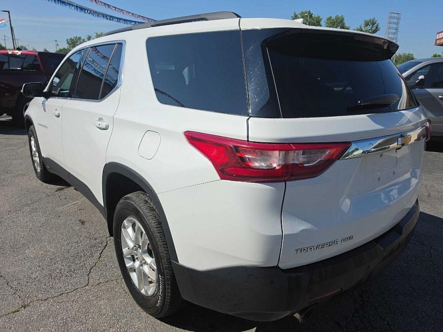 2021 WHITE /BLACK Chevrolet Traverse LT Feather AWD (1GNEVHKW3MJ) with an 3.6L V6 DOHC 24V engine, 9A transmission, located at 3304 Woodville Road, Northwood, OH, 43619, (419) 210-8019, 41.612694, -83.480743 - Your #1 Destination for Auto Loans and mdash;No Matter Your Credit!At our dealership, we believe everyone deserves the opportunity to drive their dream car and mdash;whether you have good credit, bad credit, or no credit at all. With a wide selection of hundreds of cars, trucks, and SUVs, you'll fin- Photo#2