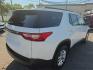 2021 WHITE /BLACK Chevrolet Traverse LT Feather AWD (1GNEVHKW3MJ) with an 3.6L V6 DOHC 24V engine, 9A transmission, located at 3304 Woodville Road, Northwood, OH, 43619, (419) 210-8019, 41.612694, -83.480743 - Your #1 Destination for Auto Loans and mdash;No Matter Your Credit!At our dealership, we believe everyone deserves the opportunity to drive their dream car and mdash;whether you have good credit, bad credit, or no credit at all. With a wide selection of hundreds of cars, trucks, and SUVs, you'll fin- Photo#4
