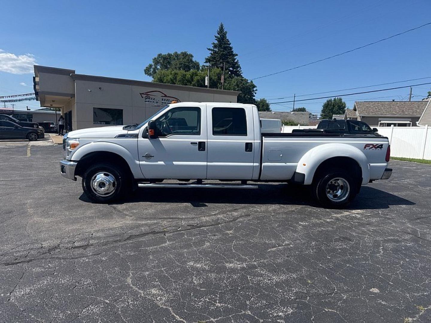 2016 WHITE /GREY Ford F-350 SD King Ranch Crew Cab Long Bed DRW 4WD (1FT8W3DT3GE) with an 6.7L V8 OHV 16V DIESEL engine, 6A transmission, located at 3304 Woodville Road, Northwood, OH, 43619, (419) 210-8019, 41.612694, -83.480743 - Your #1 Destination for Auto Loans and mdash;No Matter Your Credit!At our dealership, we believe everyone deserves the opportunity to drive their dream car and mdash;whether you have good credit, bad credit, or no credit at all. With a wide selection of hundreds of cars, trucks, and SUVs, you'll fin- Photo#1