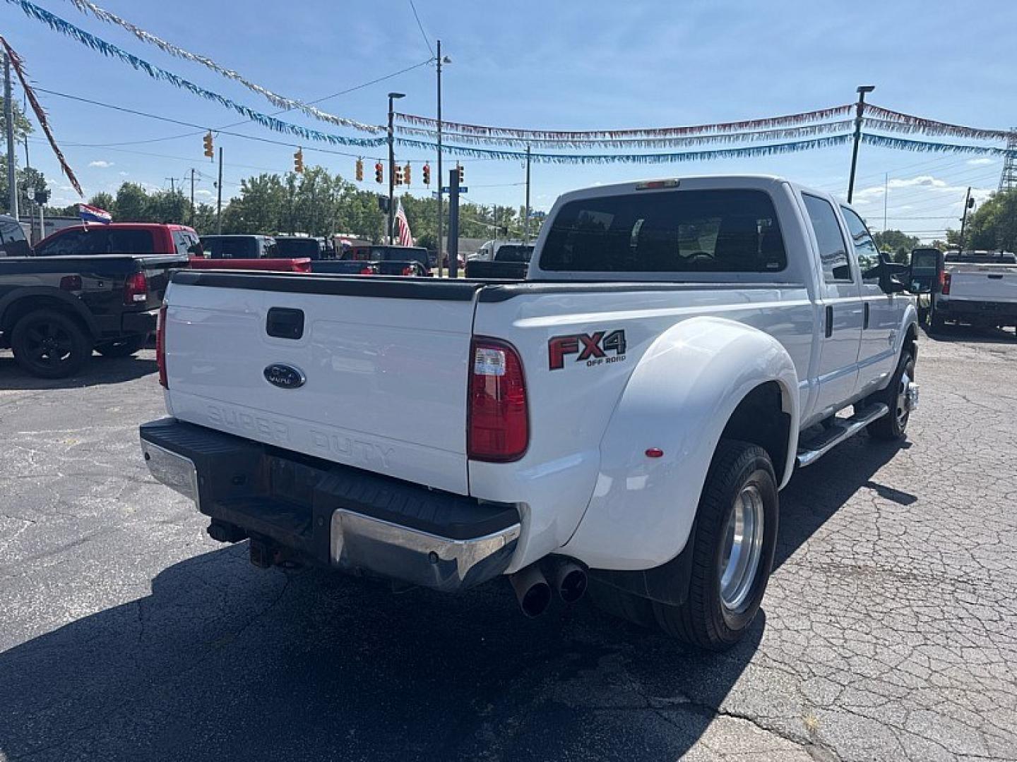 2016 WHITE /GREY Ford F-350 SD King Ranch Crew Cab Long Bed DRW 4WD (1FT8W3DT3GE) with an 6.7L V8 OHV 16V DIESEL engine, 6A transmission, located at 3304 Woodville Road, Northwood, OH, 43619, (419) 210-8019, 41.612694, -83.480743 - Your #1 Destination for Auto Loans and mdash;No Matter Your Credit!At our dealership, we believe everyone deserves the opportunity to drive their dream car and mdash;whether you have good credit, bad credit, or no credit at all. With a wide selection of hundreds of cars, trucks, and SUVs, you'll fin- Photo#4