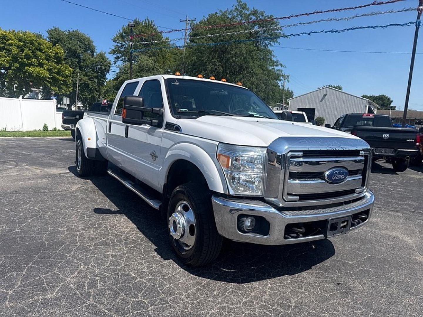 2016 WHITE /GREY Ford F-350 SD King Ranch Crew Cab Long Bed DRW 4WD (1FT8W3DT3GE) with an 6.7L V8 OHV 16V DIESEL engine, 6A transmission, located at 3304 Woodville Road, Northwood, OH, 43619, (419) 210-8019, 41.612694, -83.480743 - Your #1 Destination for Auto Loans and mdash;No Matter Your Credit!At our dealership, we believe everyone deserves the opportunity to drive their dream car and mdash;whether you have good credit, bad credit, or no credit at all. With a wide selection of hundreds of cars, trucks, and SUVs, you'll fin- Photo#6