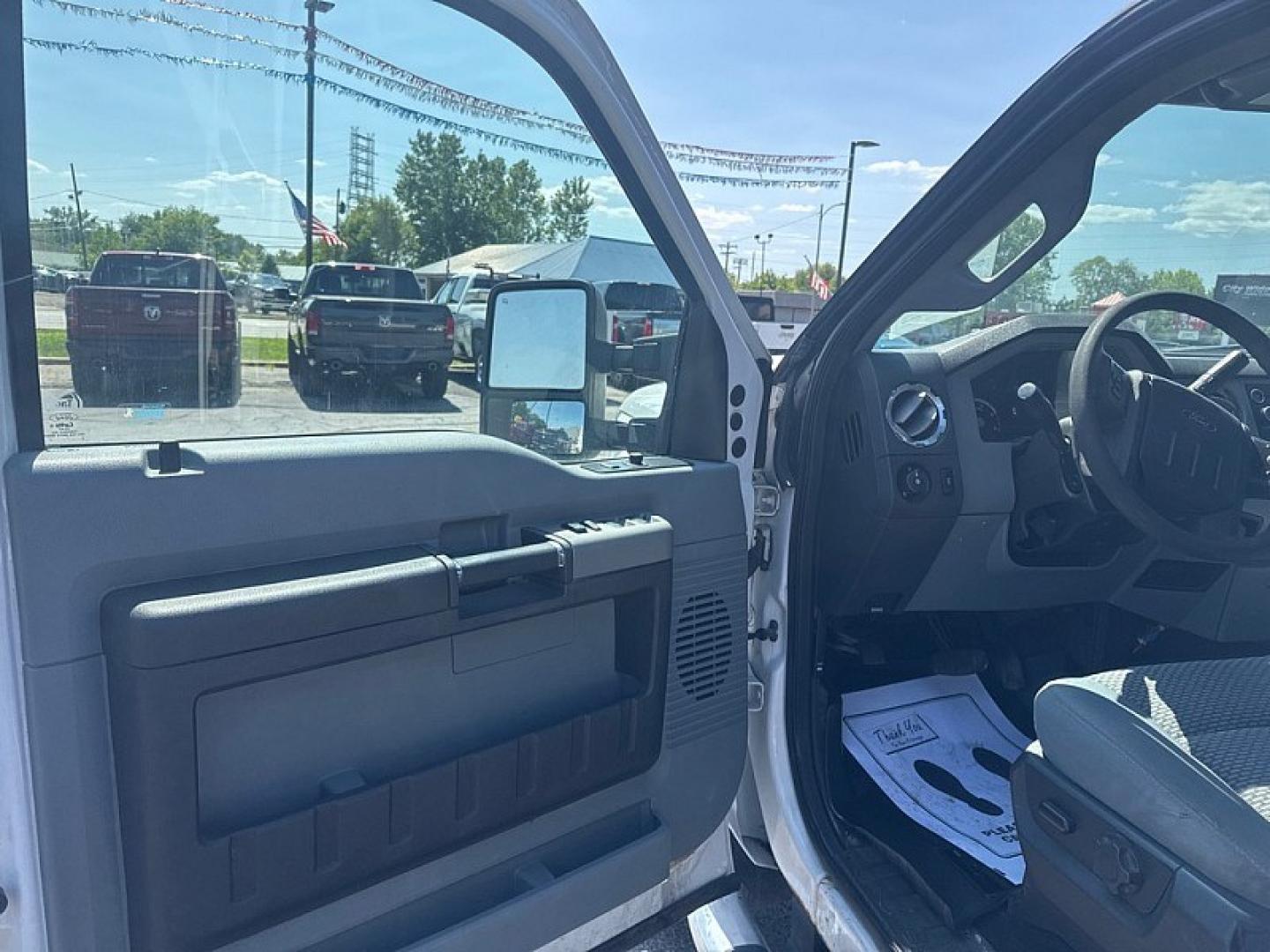 2016 WHITE /GREY Ford F-350 SD King Ranch Crew Cab Long Bed DRW 4WD (1FT8W3DT3GE) with an 6.7L V8 OHV 16V DIESEL engine, 6A transmission, located at 3304 Woodville Road, Northwood, OH, 43619, (419) 210-8019, 41.612694, -83.480743 - Your #1 Destination for Auto Loans and mdash;No Matter Your Credit!At our dealership, we believe everyone deserves the opportunity to drive their dream car and mdash;whether you have good credit, bad credit, or no credit at all. With a wide selection of hundreds of cars, trucks, and SUVs, you'll fin- Photo#8