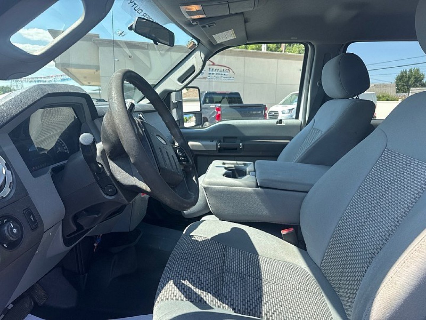 2016 WHITE /GREY Ford F-350 SD King Ranch Crew Cab Long Bed DRW 4WD (1FT8W3DT3GE) with an 6.7L V8 OHV 16V DIESEL engine, 6A transmission, located at 3304 Woodville Road, Northwood, OH, 43619, (419) 210-8019, 41.612694, -83.480743 - Your #1 Destination for Auto Loans and mdash;No Matter Your Credit!At our dealership, we believe everyone deserves the opportunity to drive their dream car and mdash;whether you have good credit, bad credit, or no credit at all. With a wide selection of hundreds of cars, trucks, and SUVs, you'll fin- Photo#9