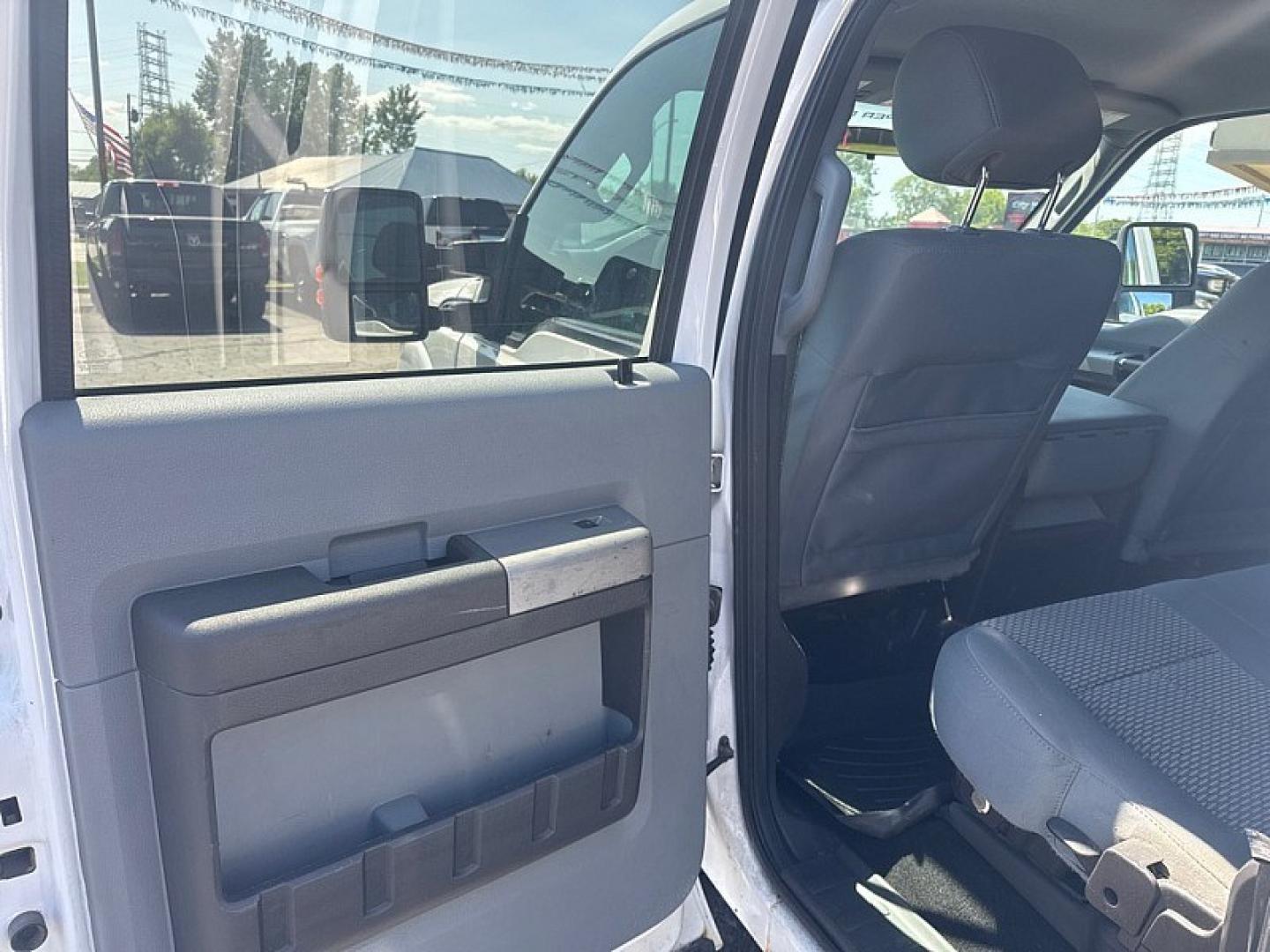 2016 WHITE /GREY Ford F-350 SD King Ranch Crew Cab Long Bed DRW 4WD (1FT8W3DT3GE) with an 6.7L V8 OHV 16V DIESEL engine, 6A transmission, located at 3304 Woodville Road, Northwood, OH, 43619, (419) 210-8019, 41.612694, -83.480743 - Your #1 Destination for Auto Loans and mdash;No Matter Your Credit!At our dealership, we believe everyone deserves the opportunity to drive their dream car and mdash;whether you have good credit, bad credit, or no credit at all. With a wide selection of hundreds of cars, trucks, and SUVs, you'll fin- Photo#10