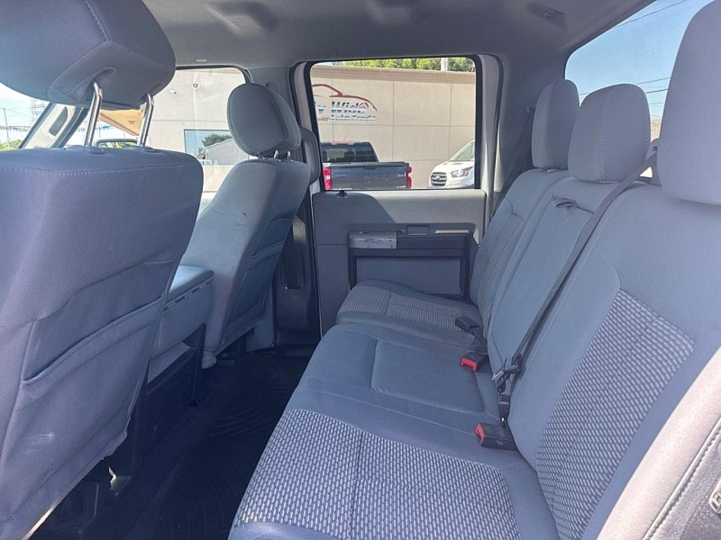 2016 WHITE /GREY Ford F-350 SD King Ranch Crew Cab Long Bed DRW 4WD (1FT8W3DT3GE) with an 6.7L V8 OHV 16V DIESEL engine, 6A transmission, located at 3304 Woodville Road, Northwood, OH, 43619, (419) 210-8019, 41.612694, -83.480743 - Your #1 Destination for Auto Loans and mdash;No Matter Your Credit!At our dealership, we believe everyone deserves the opportunity to drive their dream car and mdash;whether you have good credit, bad credit, or no credit at all. With a wide selection of hundreds of cars, trucks, and SUVs, you'll fin- Photo#11