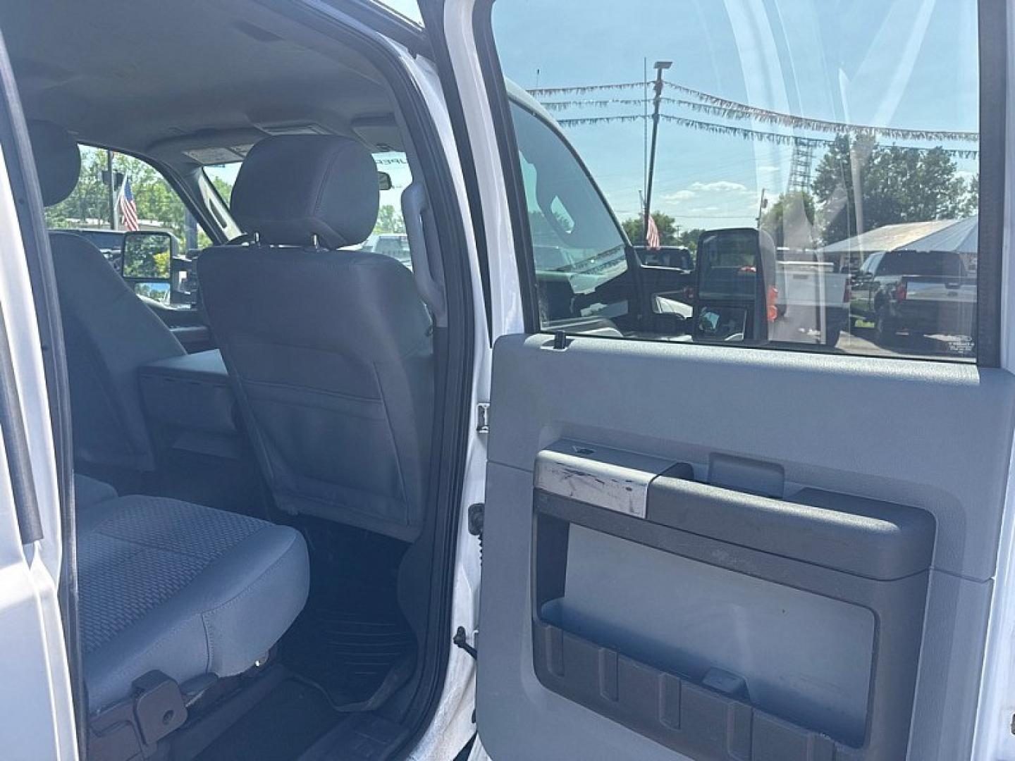 2016 WHITE /GREY Ford F-350 SD King Ranch Crew Cab Long Bed DRW 4WD (1FT8W3DT3GE) with an 6.7L V8 OHV 16V DIESEL engine, 6A transmission, located at 3304 Woodville Road, Northwood, OH, 43619, (419) 210-8019, 41.612694, -83.480743 - Your #1 Destination for Auto Loans and mdash;No Matter Your Credit!At our dealership, we believe everyone deserves the opportunity to drive their dream car and mdash;whether you have good credit, bad credit, or no credit at all. With a wide selection of hundreds of cars, trucks, and SUVs, you'll fin- Photo#12