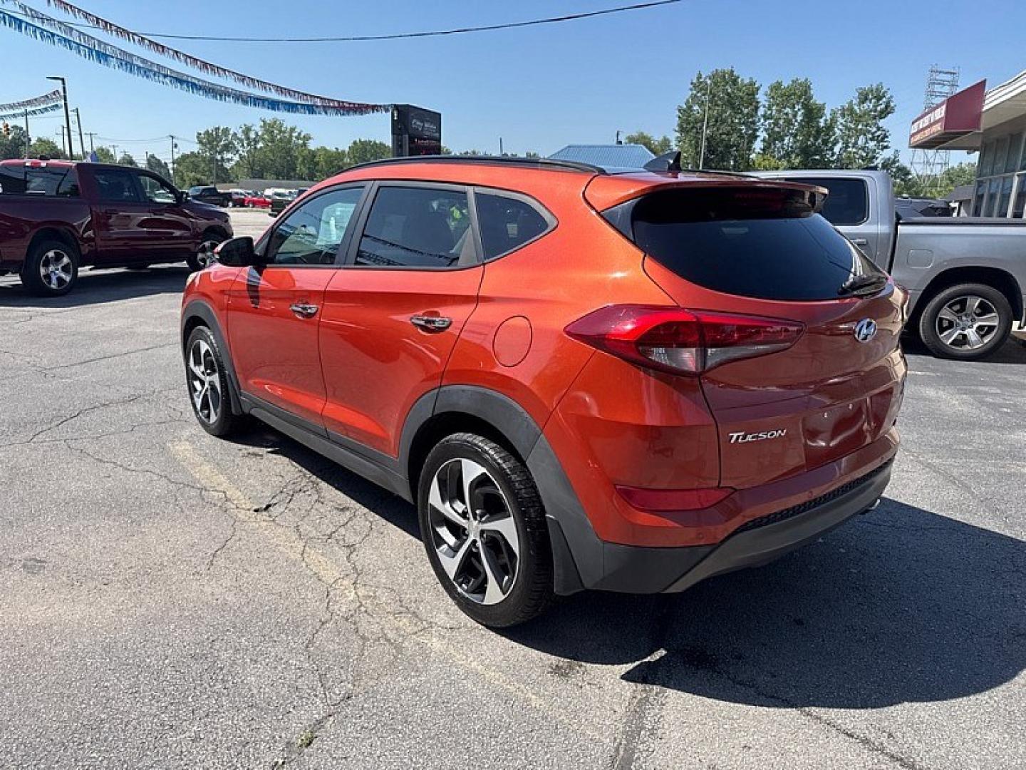 2016 RED /BLACK Hyundai Tucson Eco AWD (KM8J3CA26GU) with an 1.6L L4 DOHC 16V engine, 7A transmission, located at 3304 Woodville Road, Northwood, OH, 43619, (419) 210-8019, 41.612694, -83.480743 - Your #1 Destination for Auto Loans and mdash;No Matter Your Credit!At our dealership, we believe everyone deserves the opportunity to drive their dream car and mdash;whether you have good credit, bad credit, or no credit at all. With a wide selection of hundreds of cars, trucks, and SUVs, you'll fin- Photo#2