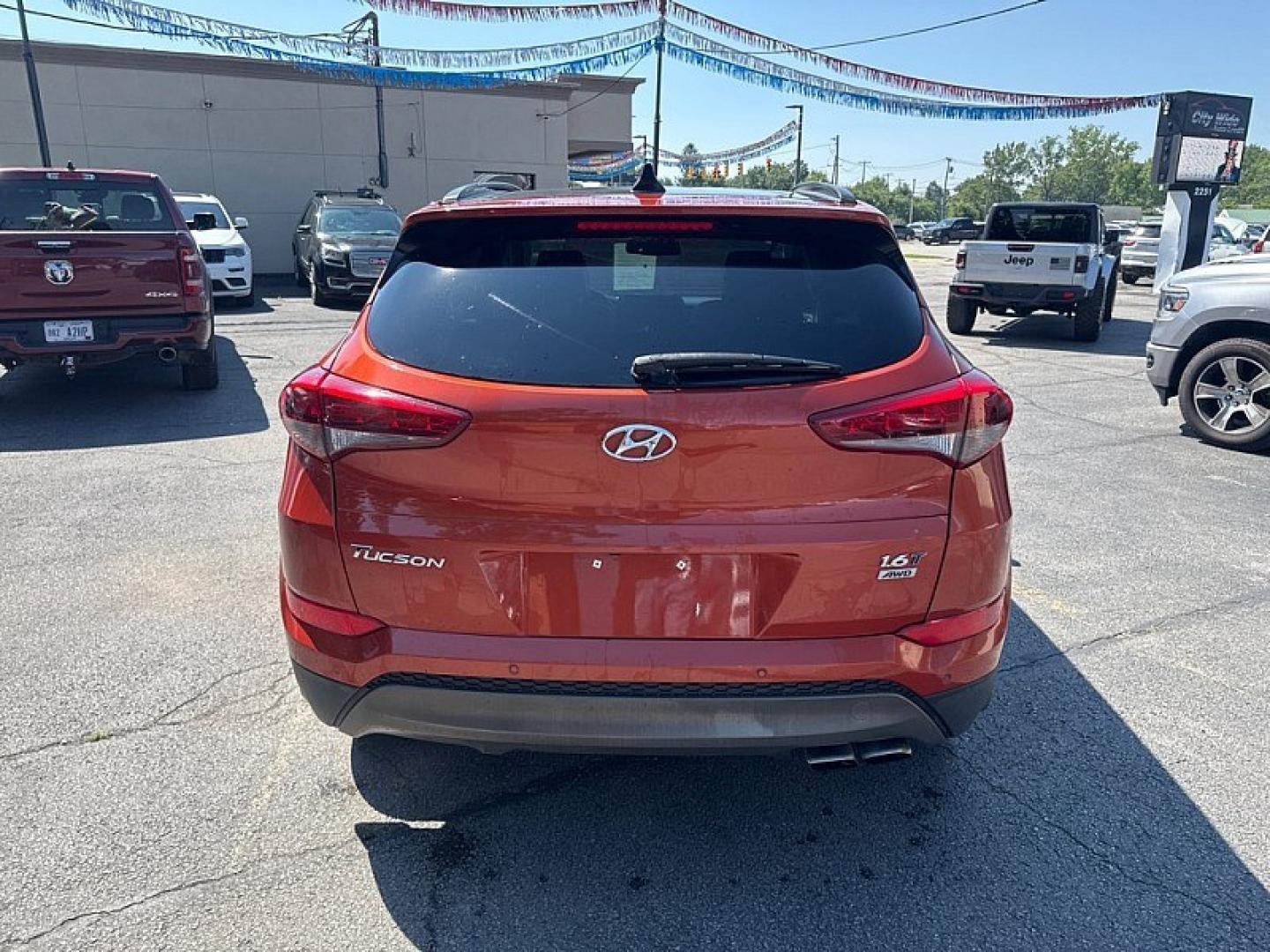 2016 RED /BLACK Hyundai Tucson Eco AWD (KM8J3CA26GU) with an 1.6L L4 DOHC 16V engine, 7A transmission, located at 3304 Woodville Road, Northwood, OH, 43619, (419) 210-8019, 41.612694, -83.480743 - Your #1 Destination for Auto Loans and mdash;No Matter Your Credit!At our dealership, we believe everyone deserves the opportunity to drive their dream car and mdash;whether you have good credit, bad credit, or no credit at all. With a wide selection of hundreds of cars, trucks, and SUVs, you'll fin- Photo#3