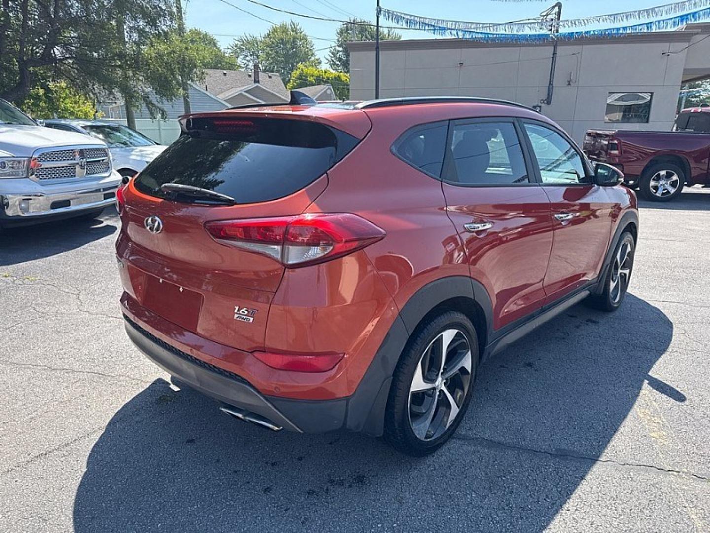 2016 RED /BLACK Hyundai Tucson Eco AWD (KM8J3CA26GU) with an 1.6L L4 DOHC 16V engine, 7A transmission, located at 3304 Woodville Road, Northwood, OH, 43619, (419) 210-8019, 41.612694, -83.480743 - Your #1 Destination for Auto Loans and mdash;No Matter Your Credit!At our dealership, we believe everyone deserves the opportunity to drive their dream car and mdash;whether you have good credit, bad credit, or no credit at all. With a wide selection of hundreds of cars, trucks, and SUVs, you'll fin- Photo#4