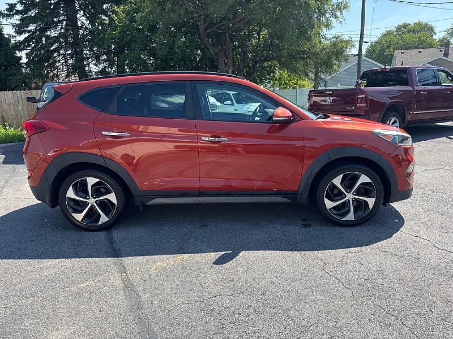 2016 RED /BLACK Hyundai Tucson Eco AWD (KM8J3CA26GU) with an 1.6L L4 DOHC 16V engine, 7A transmission, located at 3304 Woodville Road, Northwood, OH, 43619, (419) 210-8019, 41.612694, -83.480743 - Your #1 Destination for Auto Loans and mdash;No Matter Your Credit!At our dealership, we believe everyone deserves the opportunity to drive their dream car and mdash;whether you have good credit, bad credit, or no credit at all. With a wide selection of hundreds of cars, trucks, and SUVs, you'll fin- Photo#5