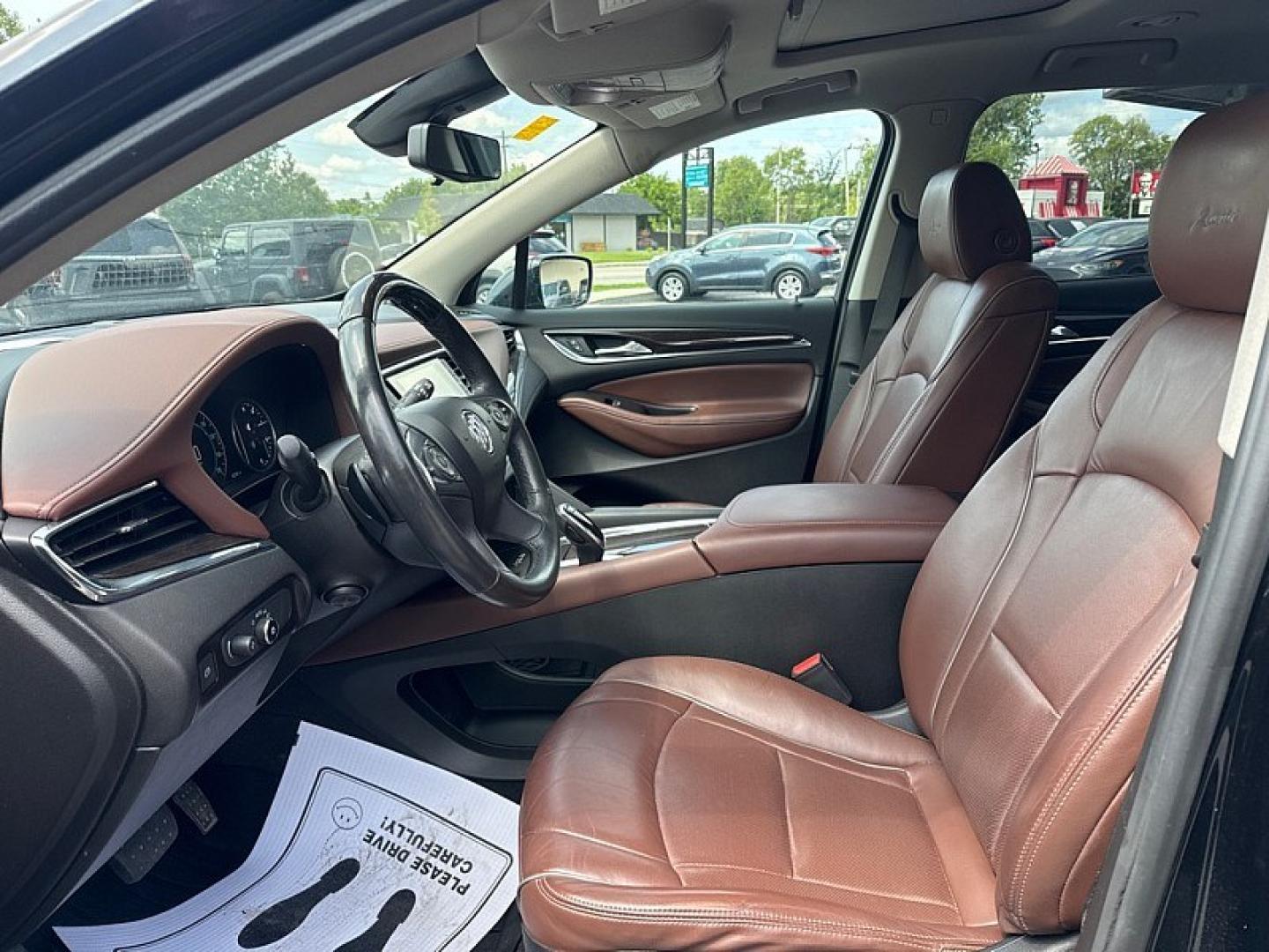 2018 BLACK /BLACK / BROWN Buick Enclave Avenir AWD (5GAEVCKWXJJ) with an 3.6L V6 DOHC 24V engine, 9A transmission, located at 3304 Woodville Road, Northwood, OH, 43619, (419) 210-8019, 41.612694, -83.480743 - Your #1 Destination for Auto Loans and mdash;No Matter Your Credit!At our dealership, we believe everyone deserves the opportunity to drive their dream car and mdash;whether you have good credit, bad credit, or no credit at all. With a wide selection of hundreds of cars, trucks, and SUVs, you'll fin- Photo#9