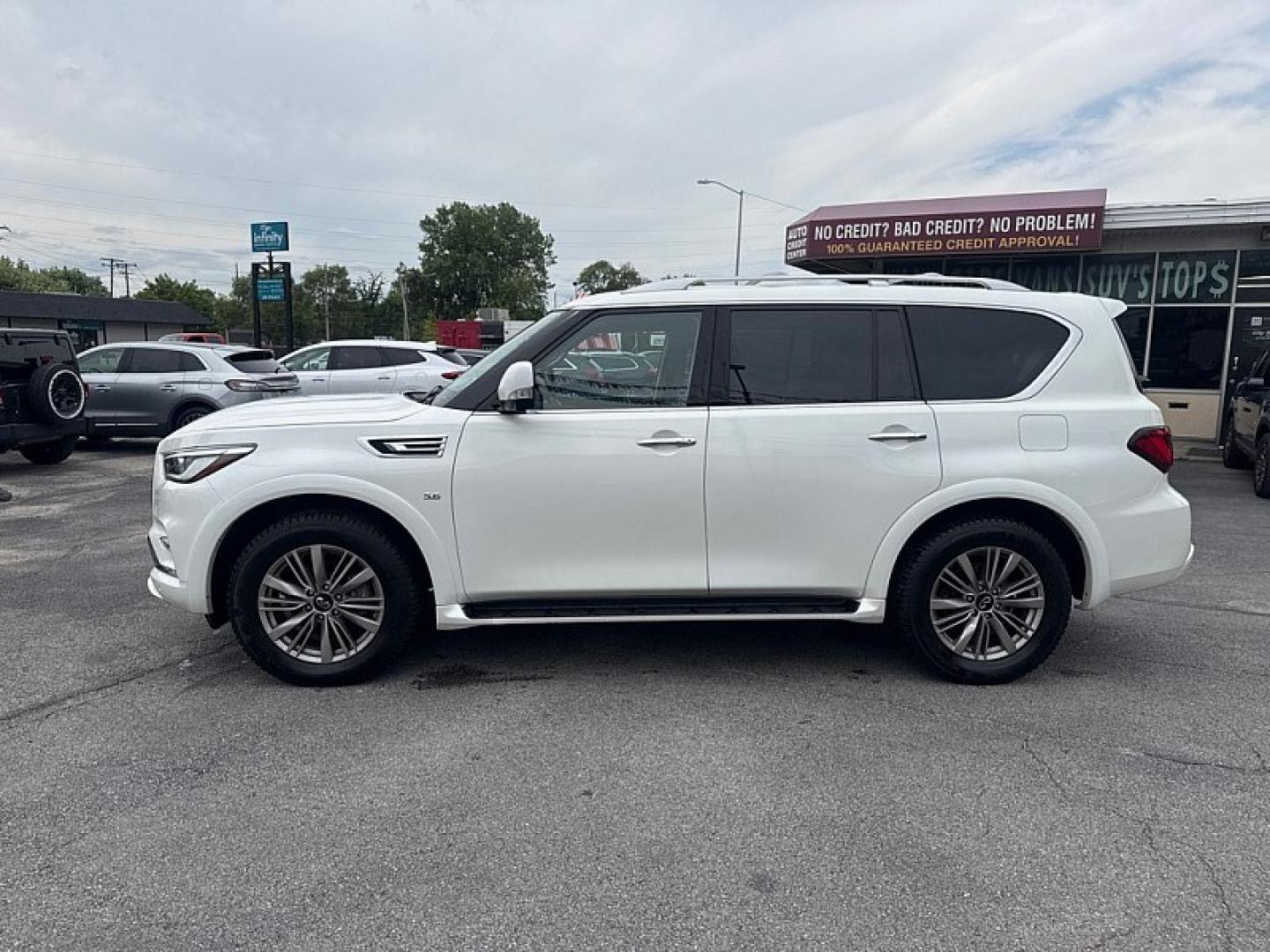2018 WHITE /BLACK Infiniti QX80 4WD (JN8AZ2NC0J9) with an 5.6L V8 DOHC 32V engine, 7A transmission, located at 3304 Woodville Road, Northwood, OH, 43619, (419) 210-8019, 41.612694, -83.480743 - Your #1 Destination for Auto Loans and mdash;No Matter Your Credit!At our dealership, we believe everyone deserves the opportunity to drive their dream car and mdash;whether you have good credit, bad credit, or no credit at all. With a wide selection of hundreds of cars, trucks, and SUVs, you'll fin- Photo#1
