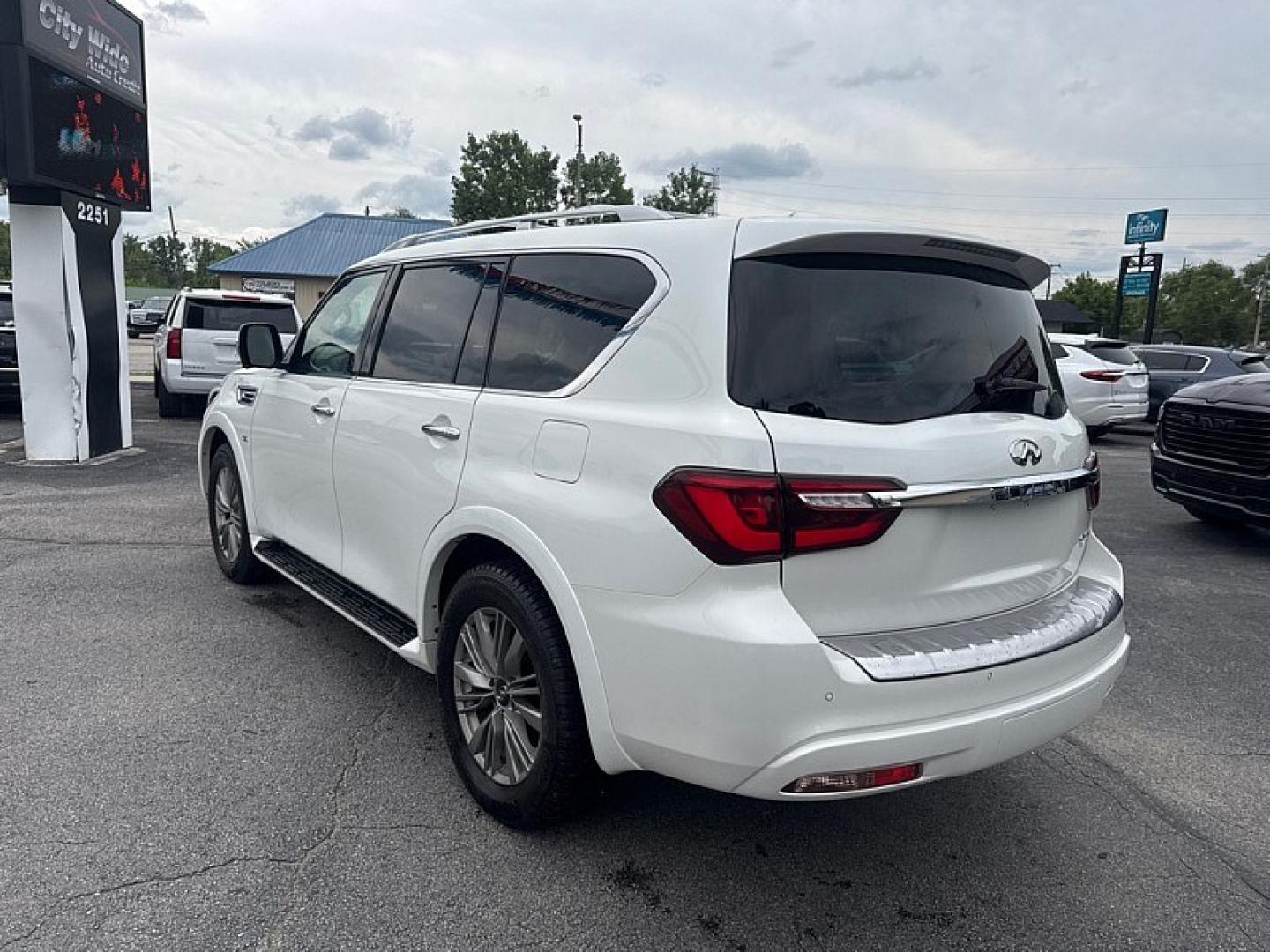 2018 WHITE /BLACK Infiniti QX80 4WD (JN8AZ2NC0J9) with an 5.6L V8 DOHC 32V engine, 7A transmission, located at 3304 Woodville Road, Northwood, OH, 43619, (419) 210-8019, 41.612694, -83.480743 - Your #1 Destination for Auto Loans and mdash;No Matter Your Credit!At our dealership, we believe everyone deserves the opportunity to drive their dream car and mdash;whether you have good credit, bad credit, or no credit at all. With a wide selection of hundreds of cars, trucks, and SUVs, you'll fin- Photo#2