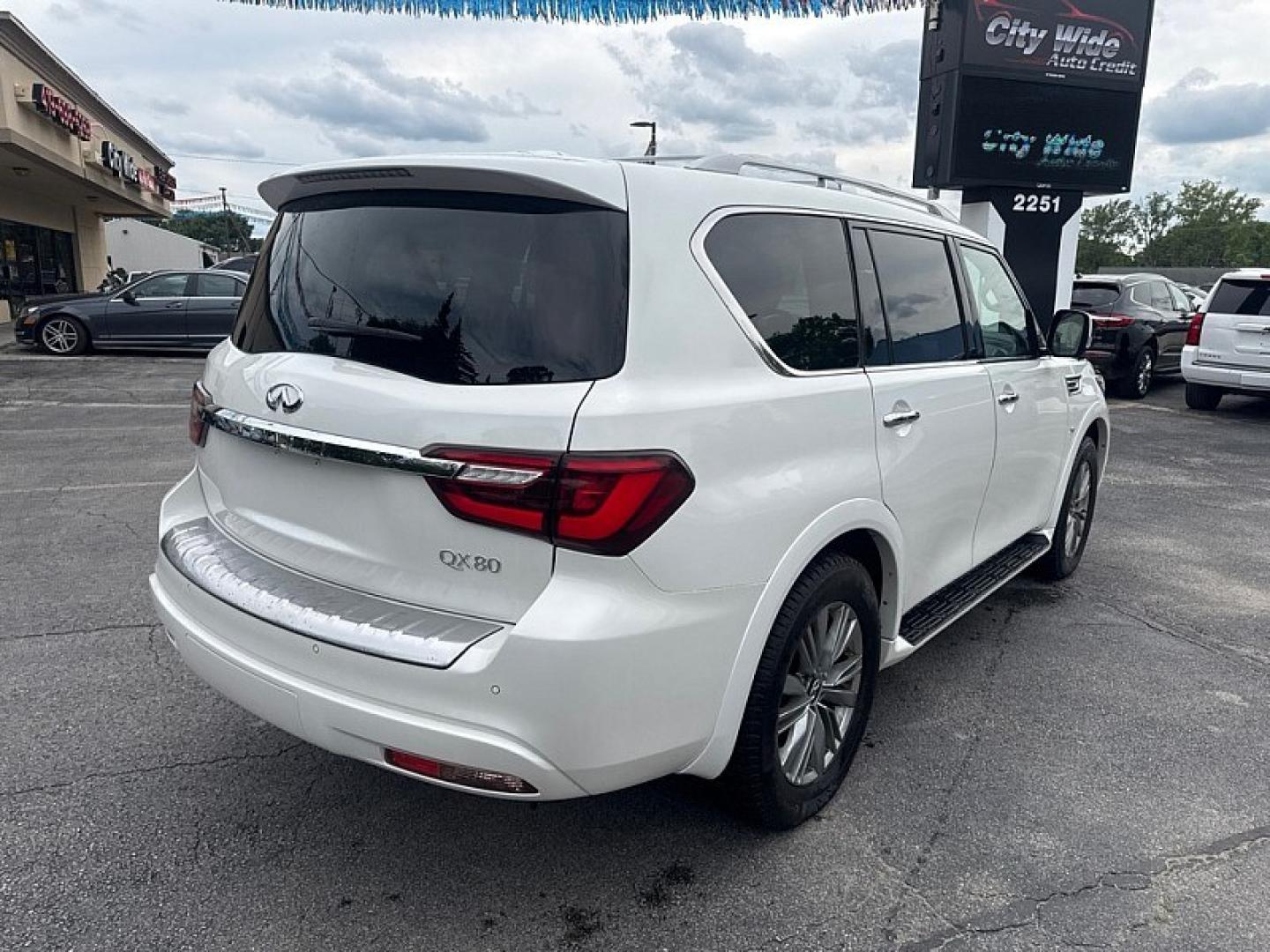 2018 WHITE /BLACK Infiniti QX80 4WD (JN8AZ2NC0J9) with an 5.6L V8 DOHC 32V engine, 7A transmission, located at 3304 Woodville Road, Northwood, OH, 43619, (419) 210-8019, 41.612694, -83.480743 - Your #1 Destination for Auto Loans and mdash;No Matter Your Credit!At our dealership, we believe everyone deserves the opportunity to drive their dream car and mdash;whether you have good credit, bad credit, or no credit at all. With a wide selection of hundreds of cars, trucks, and SUVs, you'll fin- Photo#4