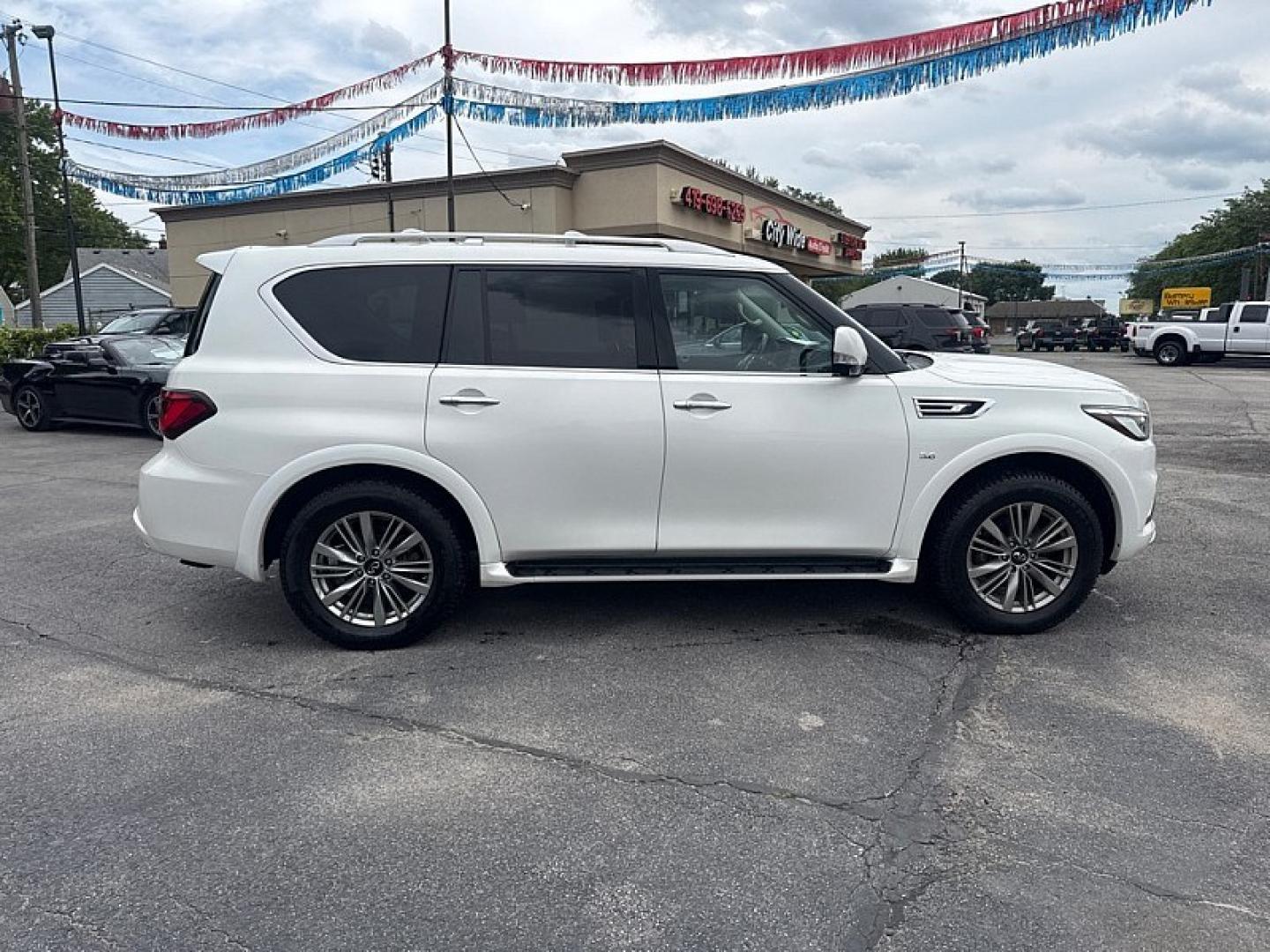 2018 WHITE /BLACK Infiniti QX80 4WD (JN8AZ2NC0J9) with an 5.6L V8 DOHC 32V engine, 7A transmission, located at 3304 Woodville Road, Northwood, OH, 43619, (419) 210-8019, 41.612694, -83.480743 - Your #1 Destination for Auto Loans and mdash;No Matter Your Credit!At our dealership, we believe everyone deserves the opportunity to drive their dream car and mdash;whether you have good credit, bad credit, or no credit at all. With a wide selection of hundreds of cars, trucks, and SUVs, you'll fin- Photo#5