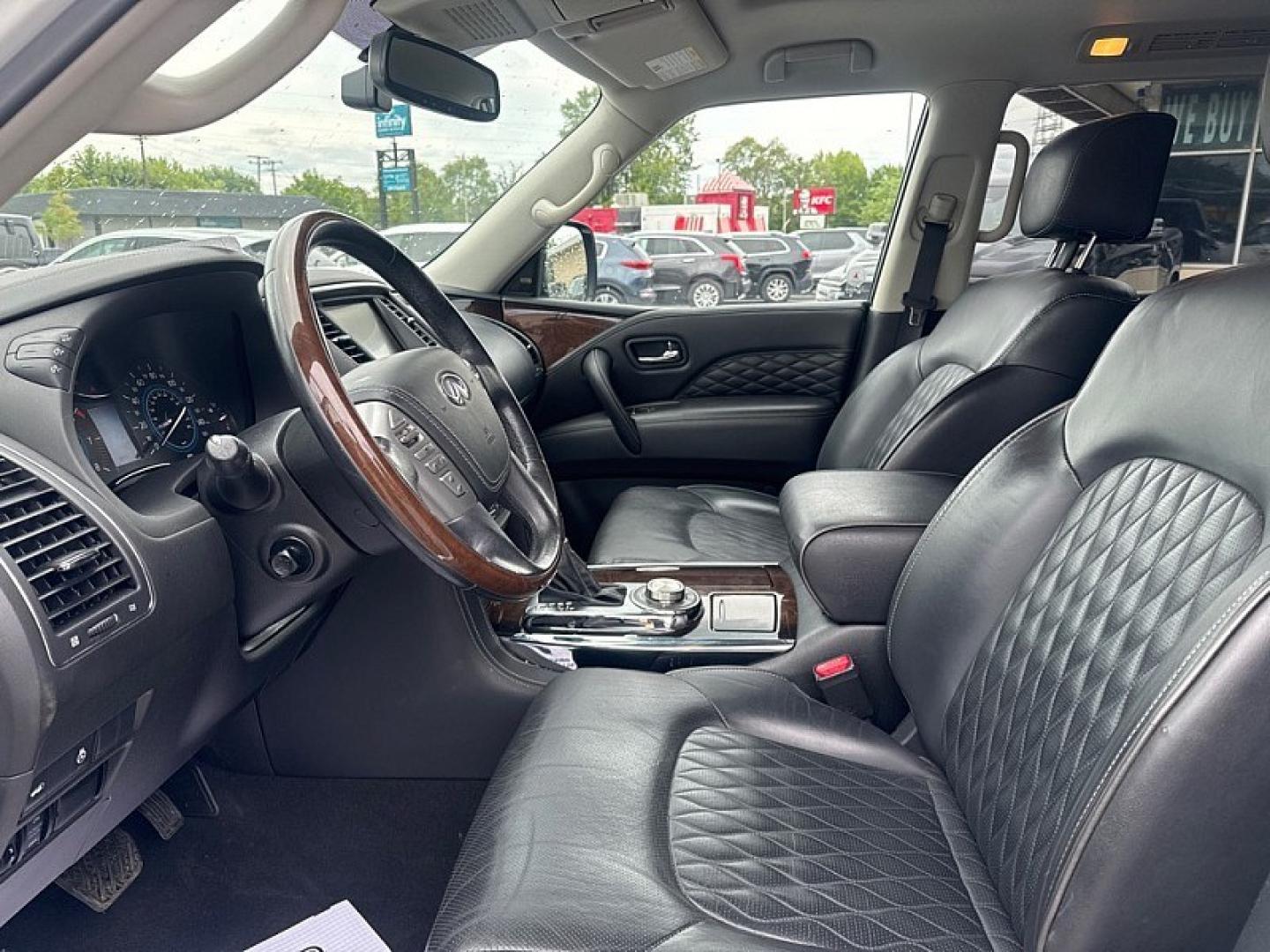 2018 WHITE /BLACK Infiniti QX80 4WD (JN8AZ2NC0J9) with an 5.6L V8 DOHC 32V engine, 7A transmission, located at 3304 Woodville Road, Northwood, OH, 43619, (419) 210-8019, 41.612694, -83.480743 - Your #1 Destination for Auto Loans and mdash;No Matter Your Credit!At our dealership, we believe everyone deserves the opportunity to drive their dream car and mdash;whether you have good credit, bad credit, or no credit at all. With a wide selection of hundreds of cars, trucks, and SUVs, you'll fin- Photo#9