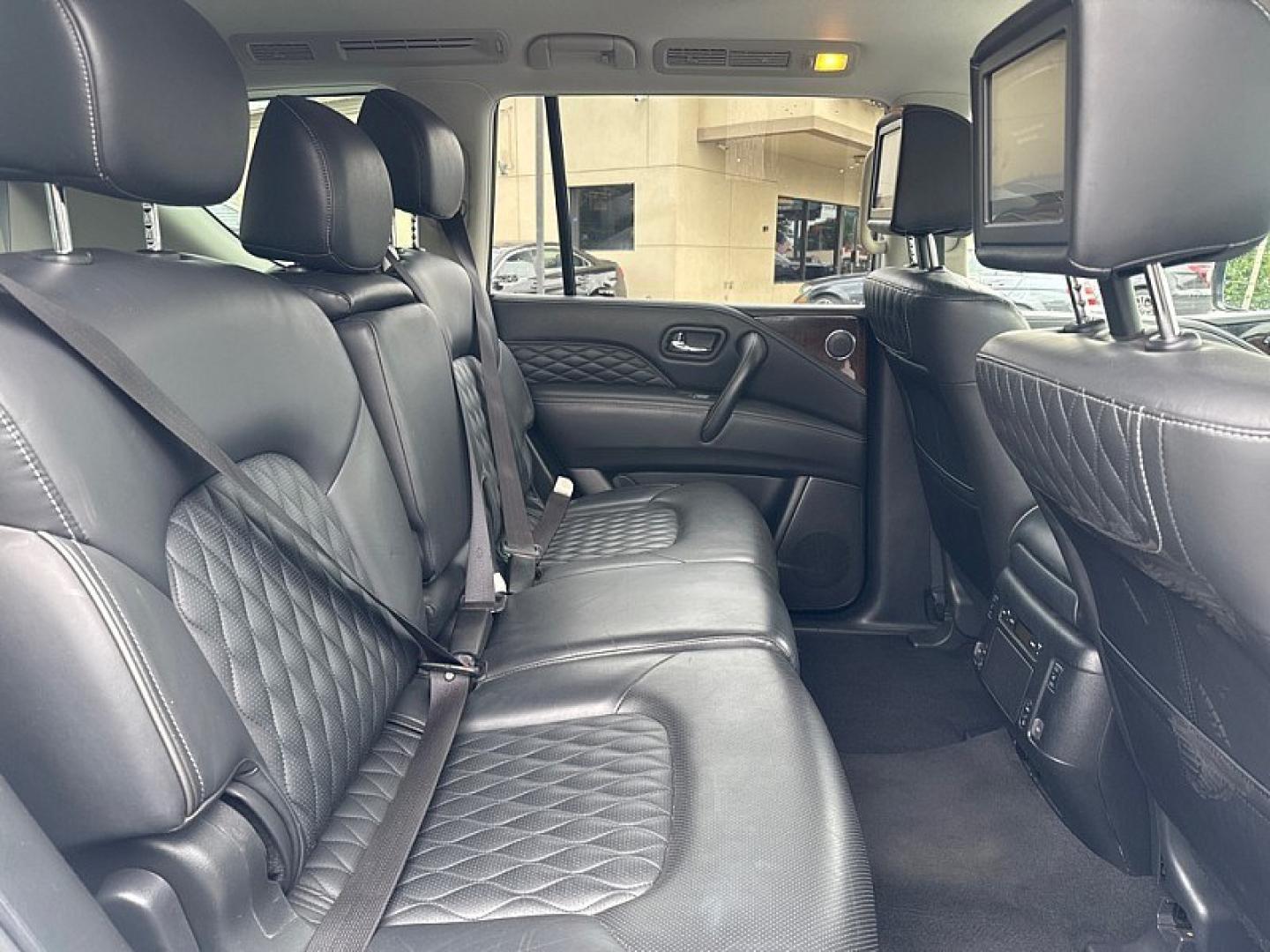 2018 WHITE /BLACK Infiniti QX80 4WD (JN8AZ2NC0J9) with an 5.6L V8 DOHC 32V engine, 7A transmission, located at 3304 Woodville Road, Northwood, OH, 43619, (419) 210-8019, 41.612694, -83.480743 - Your #1 Destination for Auto Loans and mdash;No Matter Your Credit!At our dealership, we believe everyone deserves the opportunity to drive their dream car and mdash;whether you have good credit, bad credit, or no credit at all. With a wide selection of hundreds of cars, trucks, and SUVs, you'll fin- Photo#14