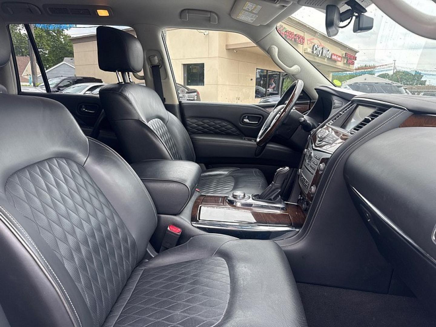 2018 WHITE /BLACK Infiniti QX80 4WD (JN8AZ2NC0J9) with an 5.6L V8 DOHC 32V engine, 7A transmission, located at 3304 Woodville Road, Northwood, OH, 43619, (419) 210-8019, 41.612694, -83.480743 - Your #1 Destination for Auto Loans and mdash;No Matter Your Credit!At our dealership, we believe everyone deserves the opportunity to drive their dream car and mdash;whether you have good credit, bad credit, or no credit at all. With a wide selection of hundreds of cars, trucks, and SUVs, you'll fin- Photo#17