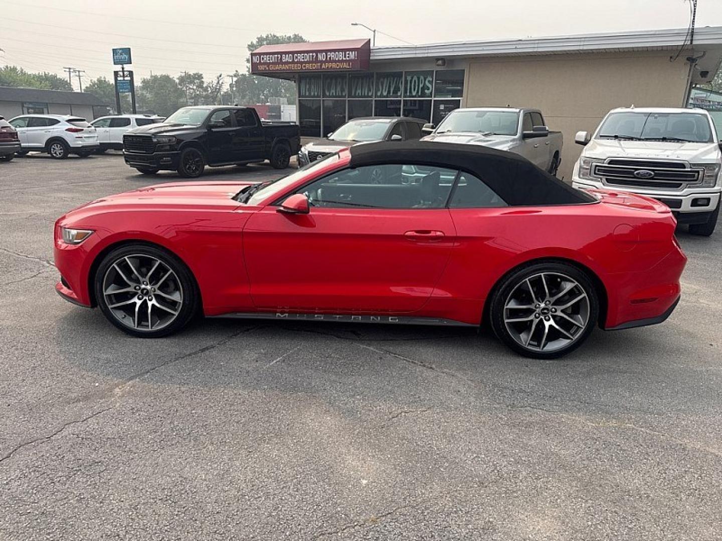 2015 RED /BLACK Ford Mustang EcoBoost Premium Convertible (1FATP8UH2F5) with an 2.3L L4 DOHC 16V engine, Auto 6-Spd SelectShift transmission, located at 3304 Woodville Road, Northwood, OH, 43619, (419) 210-8019, 41.612694, -83.480743 - Your #1 Destination for Auto Loans and mdash;No Matter Your Credit!At our dealership, we believe everyone deserves the opportunity to drive their dream car and mdash;whether you have good credit, bad credit, or no credit at all. With a wide selection of hundreds of cars, trucks, and SUVs, you'll fin- Photo#1