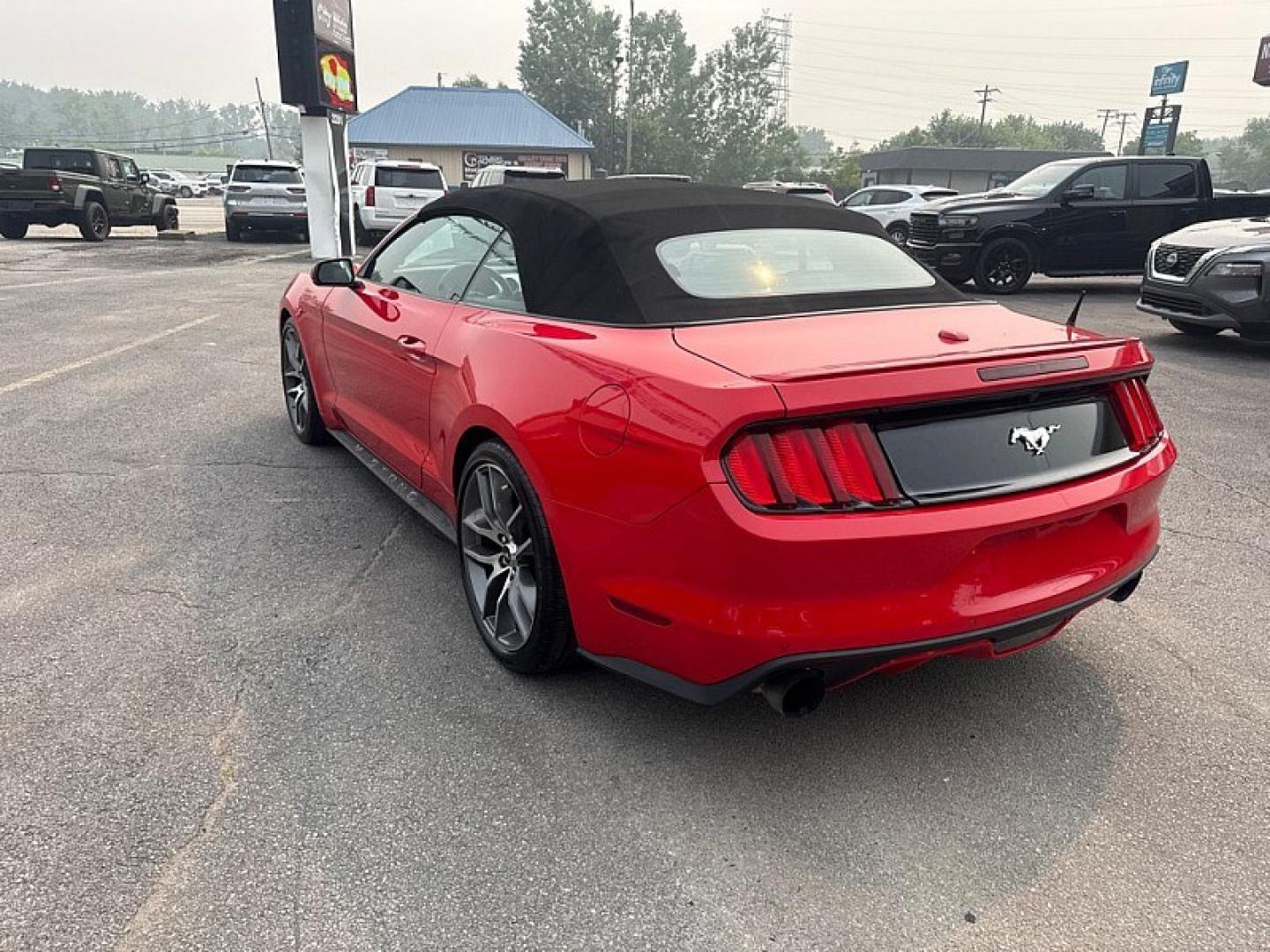2015 RED /BLACK Ford Mustang EcoBoost Premium Convertible (1FATP8UH2F5) with an 2.3L L4 DOHC 16V engine, Auto 6-Spd SelectShift transmission, located at 3304 Woodville Road, Northwood, OH, 43619, (419) 210-8019, 41.612694, -83.480743 - Your #1 Destination for Auto Loans and mdash;No Matter Your Credit!At our dealership, we believe everyone deserves the opportunity to drive their dream car and mdash;whether you have good credit, bad credit, or no credit at all. With a wide selection of hundreds of cars, trucks, and SUVs, you'll fin- Photo#2