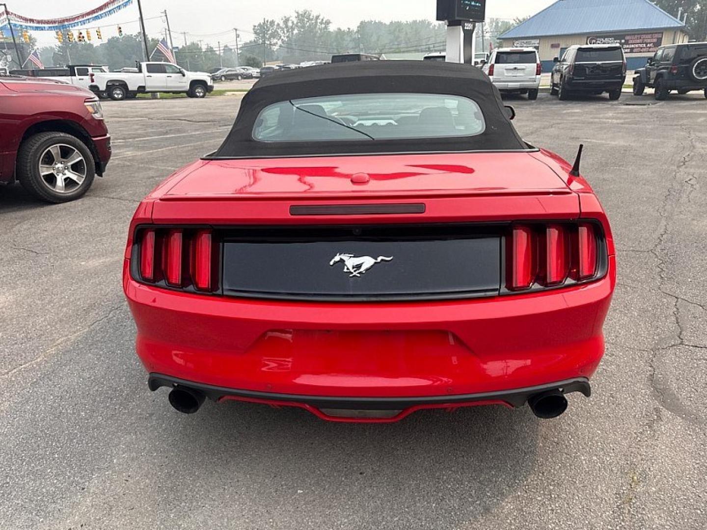 2015 RED /BLACK Ford Mustang EcoBoost Premium Convertible (1FATP8UH2F5) with an 2.3L L4 DOHC 16V engine, Auto 6-Spd SelectShift transmission, located at 3304 Woodville Road, Northwood, OH, 43619, (419) 210-8019, 41.612694, -83.480743 - Your #1 Destination for Auto Loans and mdash;No Matter Your Credit!At our dealership, we believe everyone deserves the opportunity to drive their dream car and mdash;whether you have good credit, bad credit, or no credit at all. With a wide selection of hundreds of cars, trucks, and SUVs, you'll fin- Photo#3