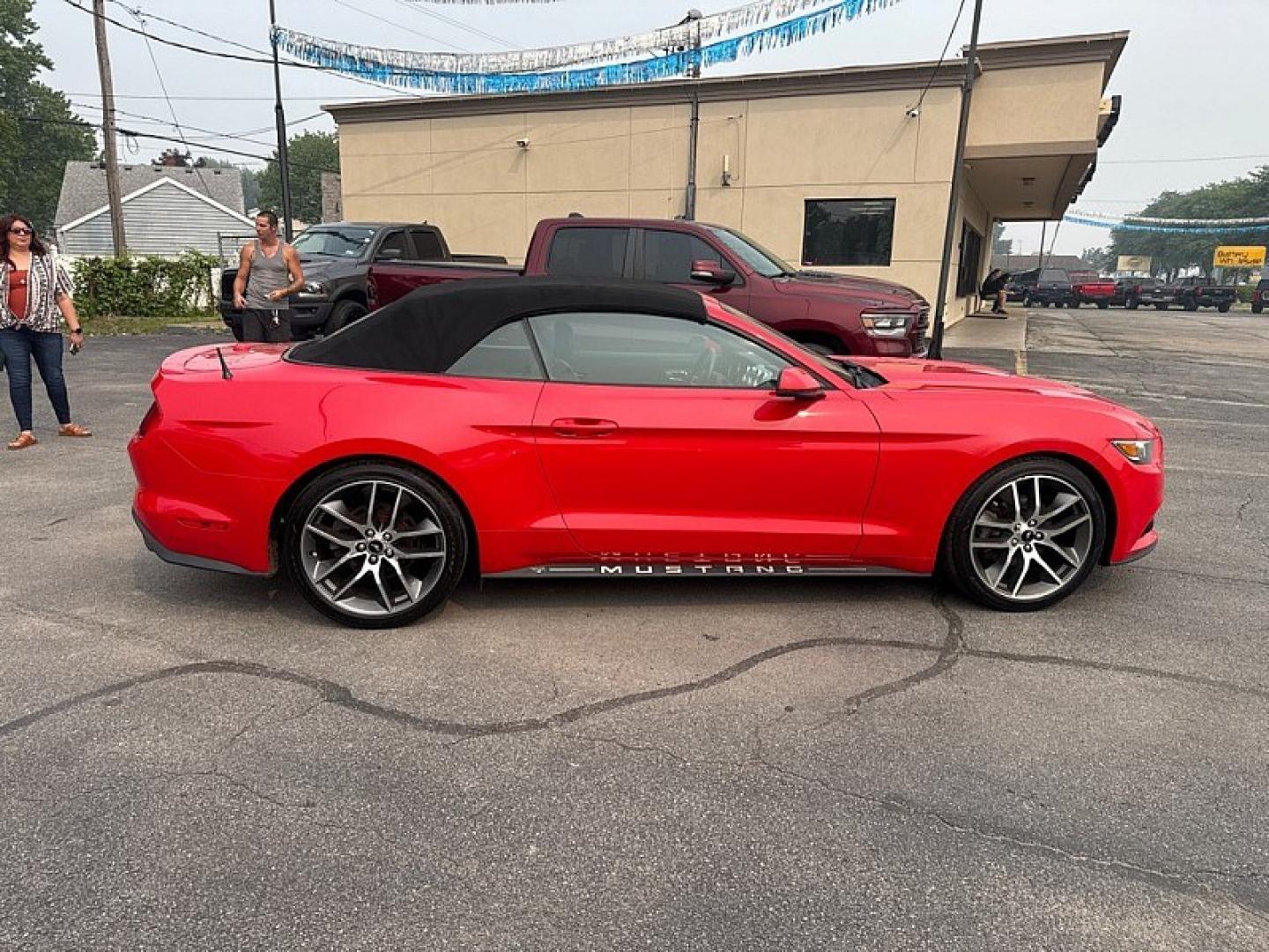 2015 RED /BLACK Ford Mustang EcoBoost Premium Convertible (1FATP8UH2F5) with an 2.3L L4 DOHC 16V engine, Auto 6-Spd SelectShift transmission, located at 3304 Woodville Road, Northwood, OH, 43619, (419) 210-8019, 41.612694, -83.480743 - Your #1 Destination for Auto Loans and mdash;No Matter Your Credit!At our dealership, we believe everyone deserves the opportunity to drive their dream car and mdash;whether you have good credit, bad credit, or no credit at all. With a wide selection of hundreds of cars, trucks, and SUVs, you'll fin- Photo#5