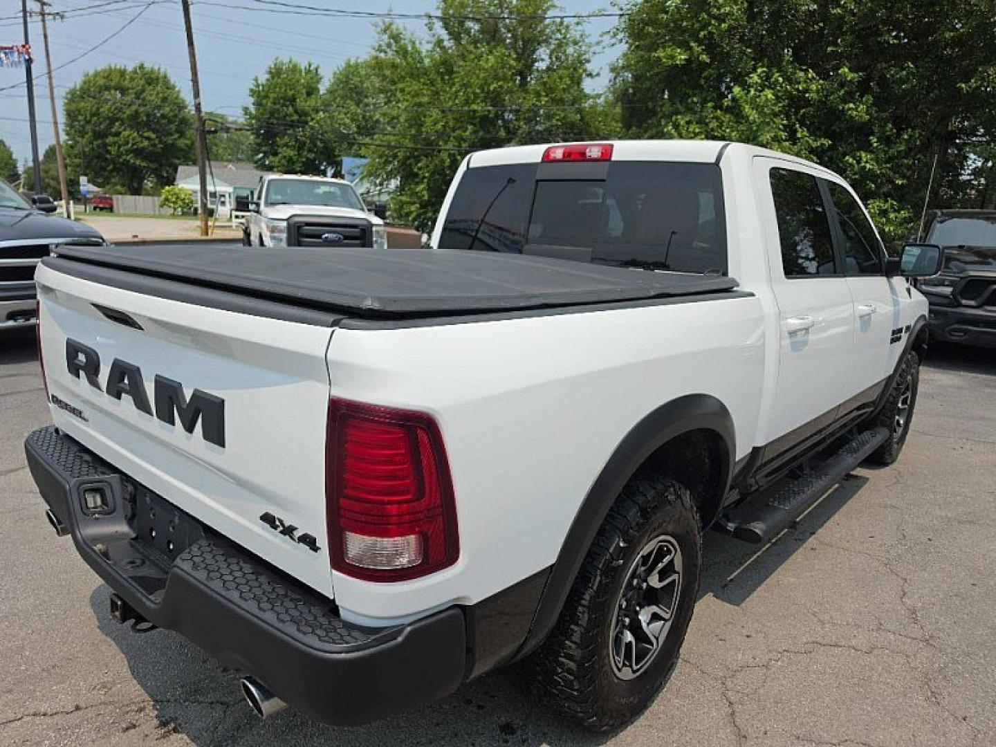 2017 WHITE /BLACK/RED RAM 1500 Rebel Crew Cab SWB 4WD (1C6RR7YT6HS) with an 5.7L V8 OHV 16V engine, 8A transmission, located at 3304 Woodville Road, Northwood, OH, 43619, (419) 210-8019, 41.612694, -83.480743 - Your #1 Destination for Auto Loans and mdash;No Matter Your Credit!At our dealership, we believe everyone deserves the opportunity to drive their dream car and mdash;whether you have good credit, bad credit, or no credit at all. With a wide selection of hundreds of cars, trucks, and SUVs, you'll fin- Photo#4