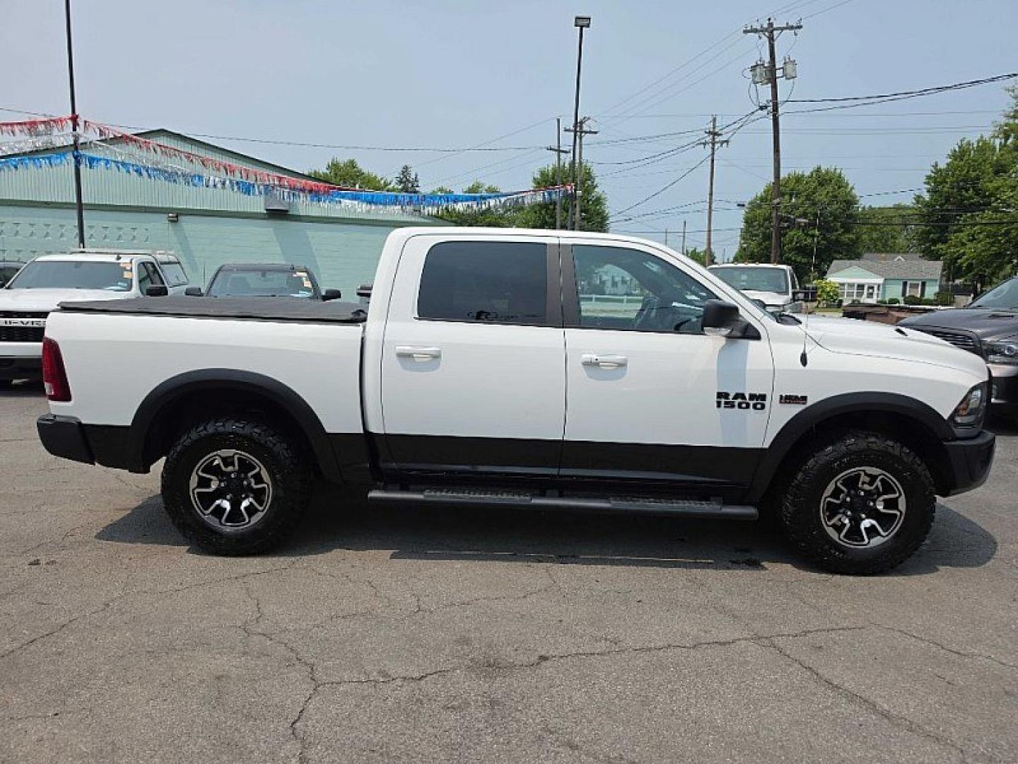 2017 WHITE /BLACK/RED RAM 1500 Rebel Crew Cab SWB 4WD (1C6RR7YT6HS) with an 5.7L V8 OHV 16V engine, 8A transmission, located at 3304 Woodville Road, Northwood, OH, 43619, (419) 210-8019, 41.612694, -83.480743 - Your #1 Destination for Auto Loans and mdash;No Matter Your Credit!At our dealership, we believe everyone deserves the opportunity to drive their dream car and mdash;whether you have good credit, bad credit, or no credit at all. With a wide selection of hundreds of cars, trucks, and SUVs, you'll fin- Photo#26