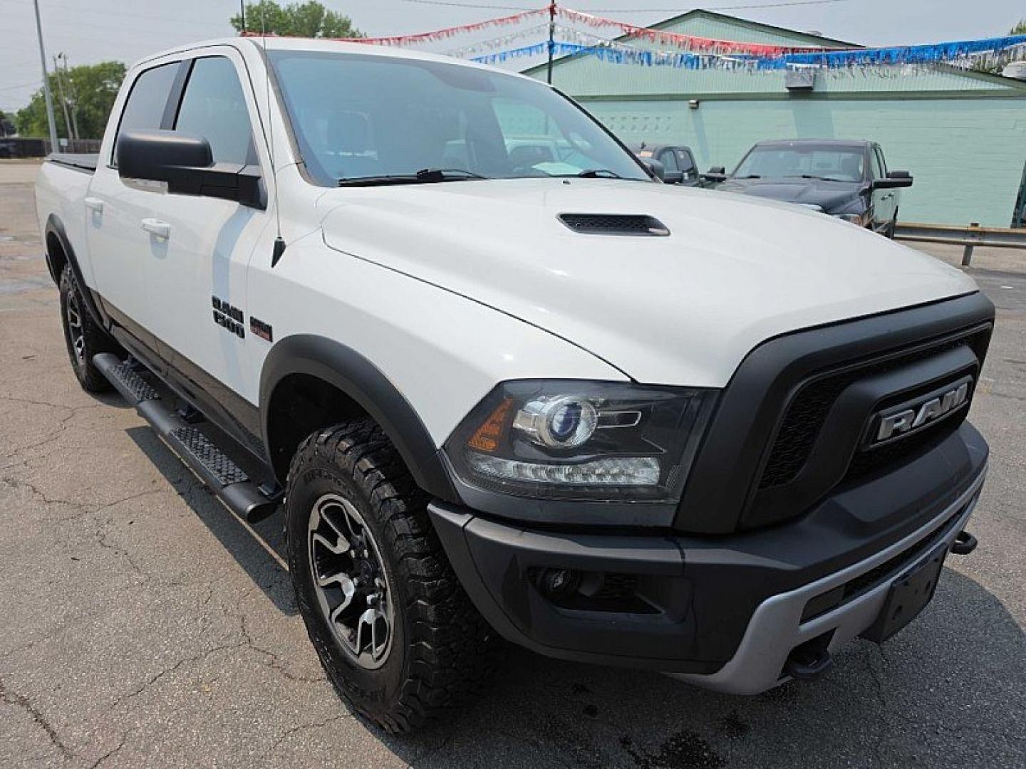 2017 WHITE /BLACK/RED RAM 1500 Rebel Crew Cab SWB 4WD (1C6RR7YT6HS) with an 5.7L V8 OHV 16V engine, 8A transmission, located at 3304 Woodville Road, Northwood, OH, 43619, (419) 210-8019, 41.612694, -83.480743 - Your #1 Destination for Auto Loans and mdash;No Matter Your Credit!At our dealership, we believe everyone deserves the opportunity to drive their dream car and mdash;whether you have good credit, bad credit, or no credit at all. With a wide selection of hundreds of cars, trucks, and SUVs, you'll fin- Photo#27