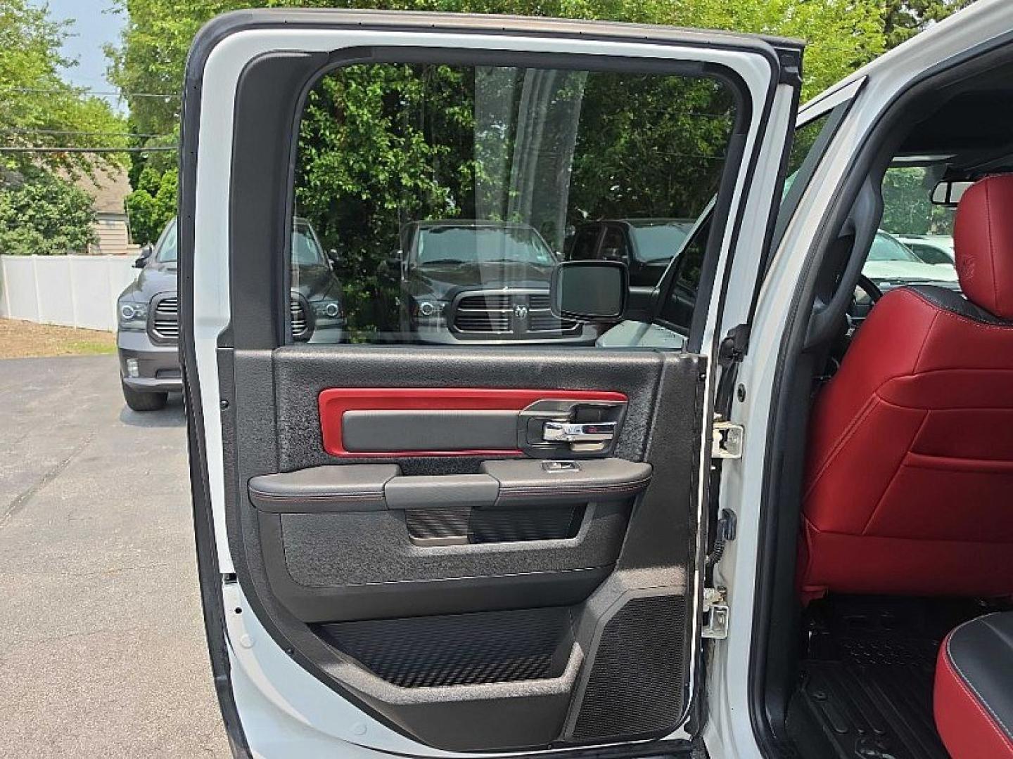 2017 WHITE /BLACK/RED RAM 1500 Rebel Crew Cab SWB 4WD (1C6RR7YT6HS) with an 5.7L V8 OHV 16V engine, 8A transmission, located at 3304 Woodville Road, Northwood, OH, 43619, (419) 210-8019, 41.612694, -83.480743 - Your #1 Destination for Auto Loans and mdash;No Matter Your Credit!At our dealership, we believe everyone deserves the opportunity to drive their dream car and mdash;whether you have good credit, bad credit, or no credit at all. With a wide selection of hundreds of cars, trucks, and SUVs, you'll fin- Photo#31