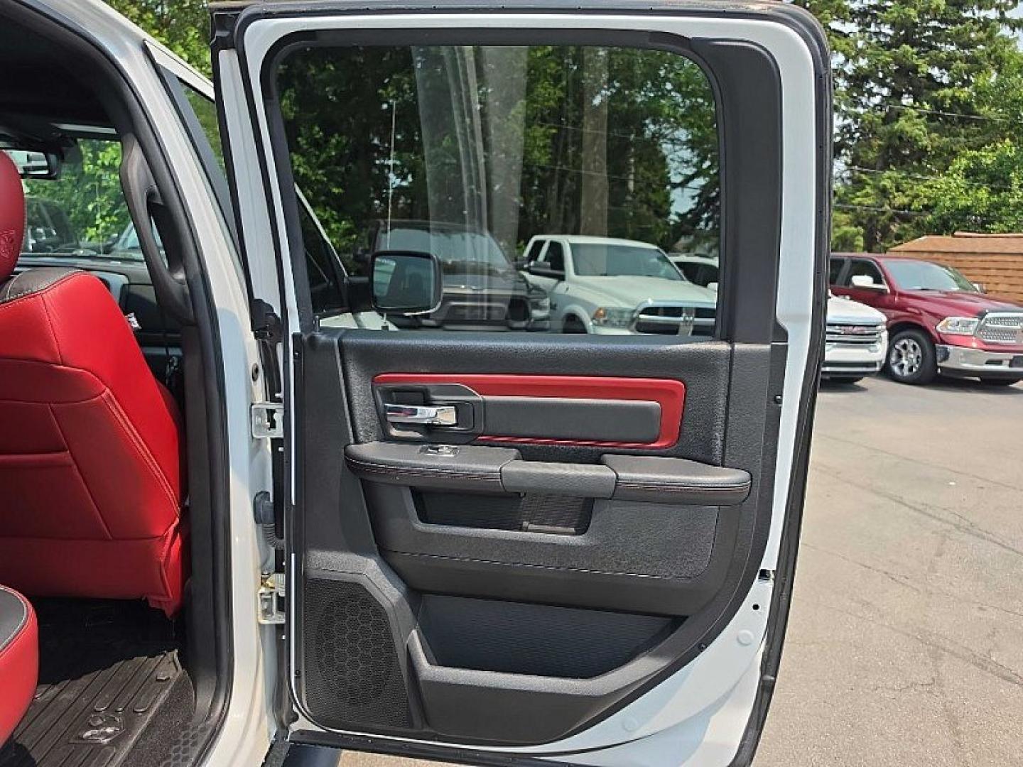 2017 WHITE /BLACK/RED RAM 1500 Rebel Crew Cab SWB 4WD (1C6RR7YT6HS) with an 5.7L V8 OHV 16V engine, 8A transmission, located at 3304 Woodville Road, Northwood, OH, 43619, (419) 210-8019, 41.612694, -83.480743 - Your #1 Destination for Auto Loans and mdash;No Matter Your Credit!At our dealership, we believe everyone deserves the opportunity to drive their dream car and mdash;whether you have good credit, bad credit, or no credit at all. With a wide selection of hundreds of cars, trucks, and SUVs, you'll fin- Photo#34